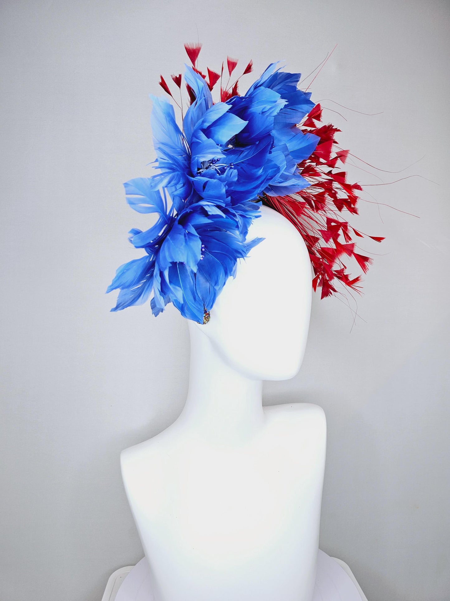 kentucky derby hat fascinator rainbow colorful crystal rhinestone headband with cobalt royal blue feather flowers and branching red feathers