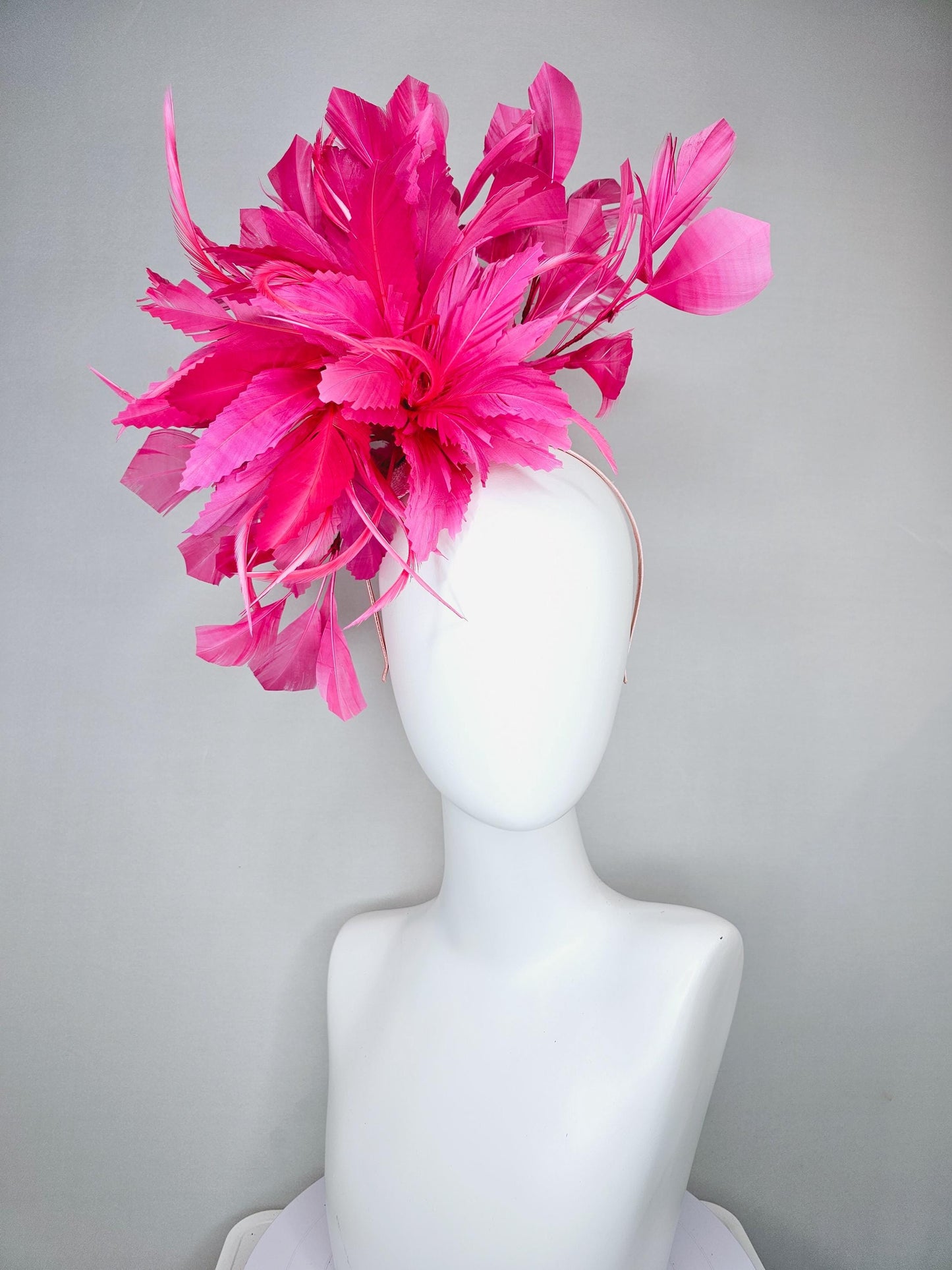 kentucky derby hat fascinator with bright hot pink branching feathers