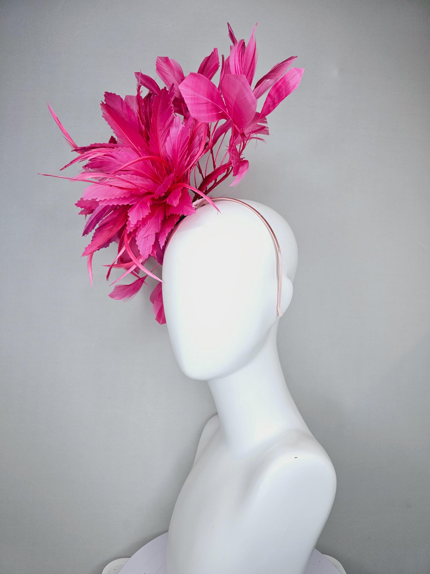 kentucky derby hat fascinator with bright hot pink branching feathers