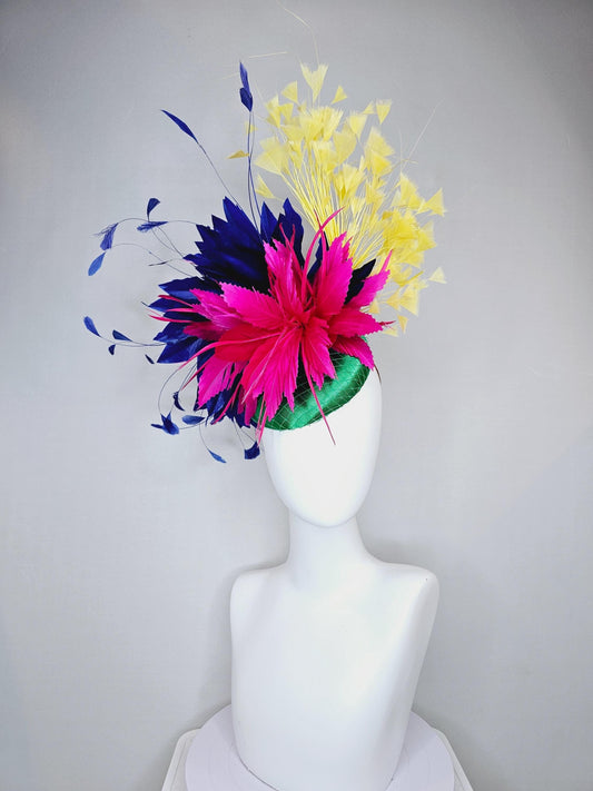 kentucky derby hat fascinator green satin with netting,bright hot pink feather flower,royal navy blue feathers and branching yellow feathers