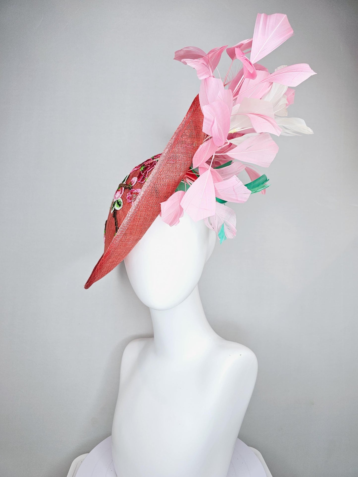 kentucky derby hat fascinator coral peach sinamay saucer with pink green brown floral embroidery,light pink and green branching feathers