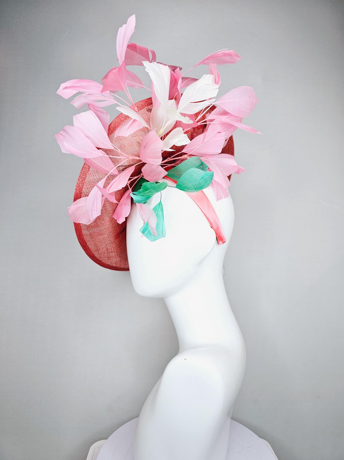 kentucky derby hat fascinator coral peach sinamay saucer with pink green brown floral embroidery,light pink and green branching feathers