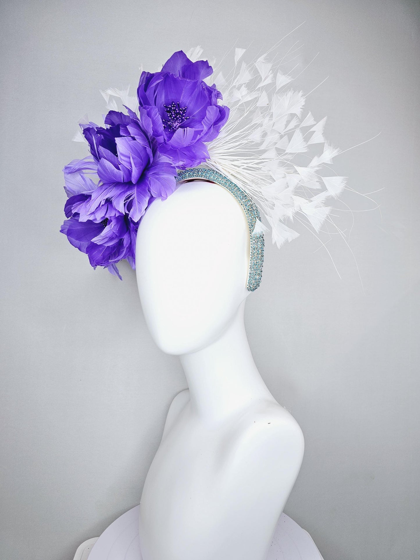 kentucky derby hat fascinator purple violet feather flowers, white branching feathers, turquoise sky blue crystal rhinestone headband