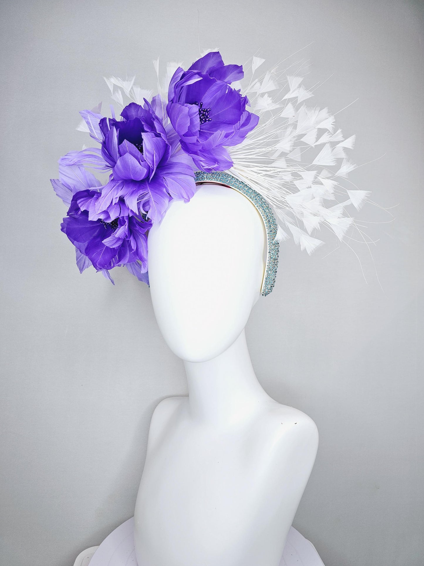 kentucky derby hat fascinator purple violet feather flowers, white branching feathers, turquoise sky blue crystal rhinestone headband