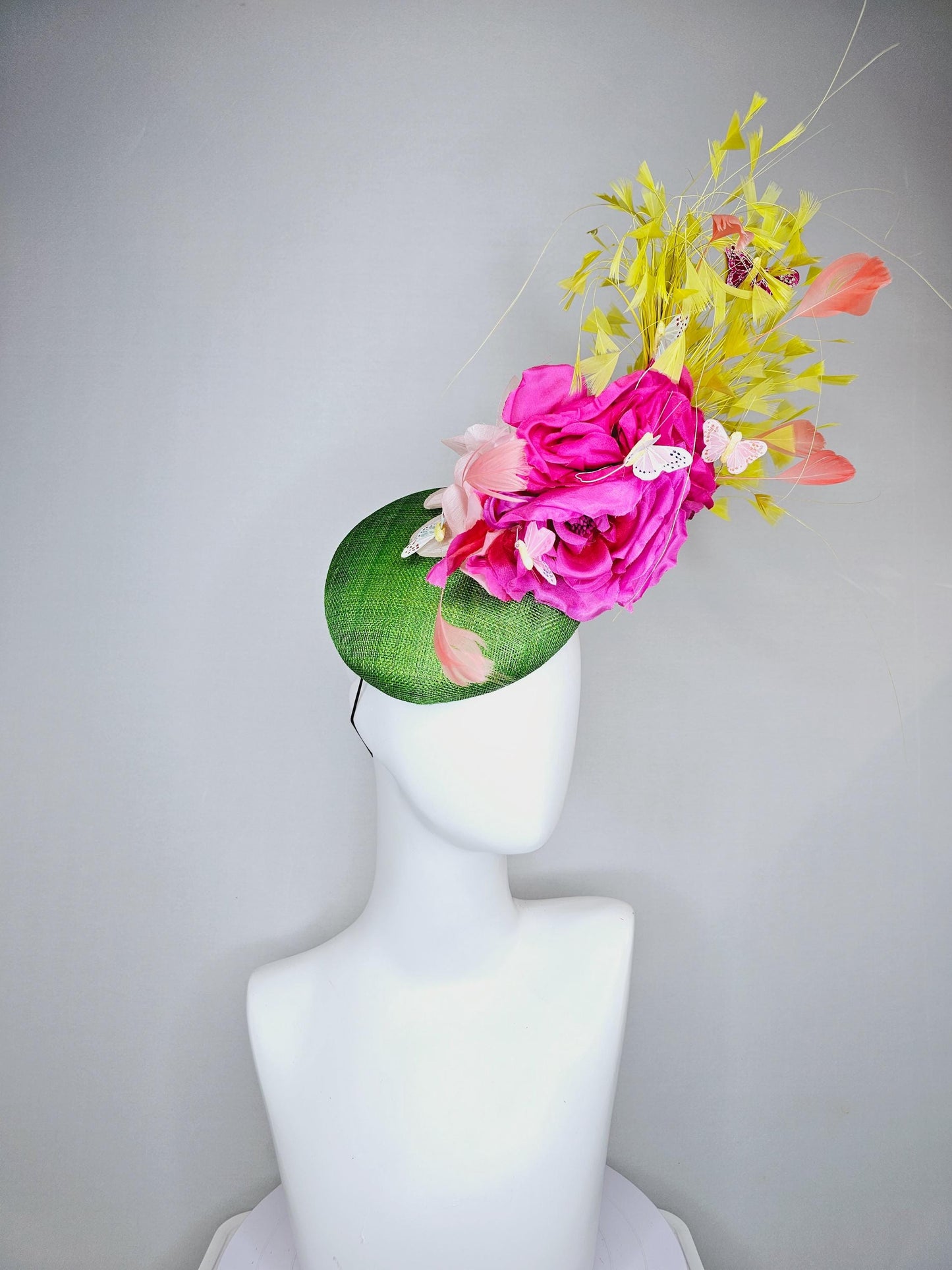 kentucky derby hat fascinator green sinamay, fuchsia pink silk organza flowers, yellow branching feathers and white butterflies