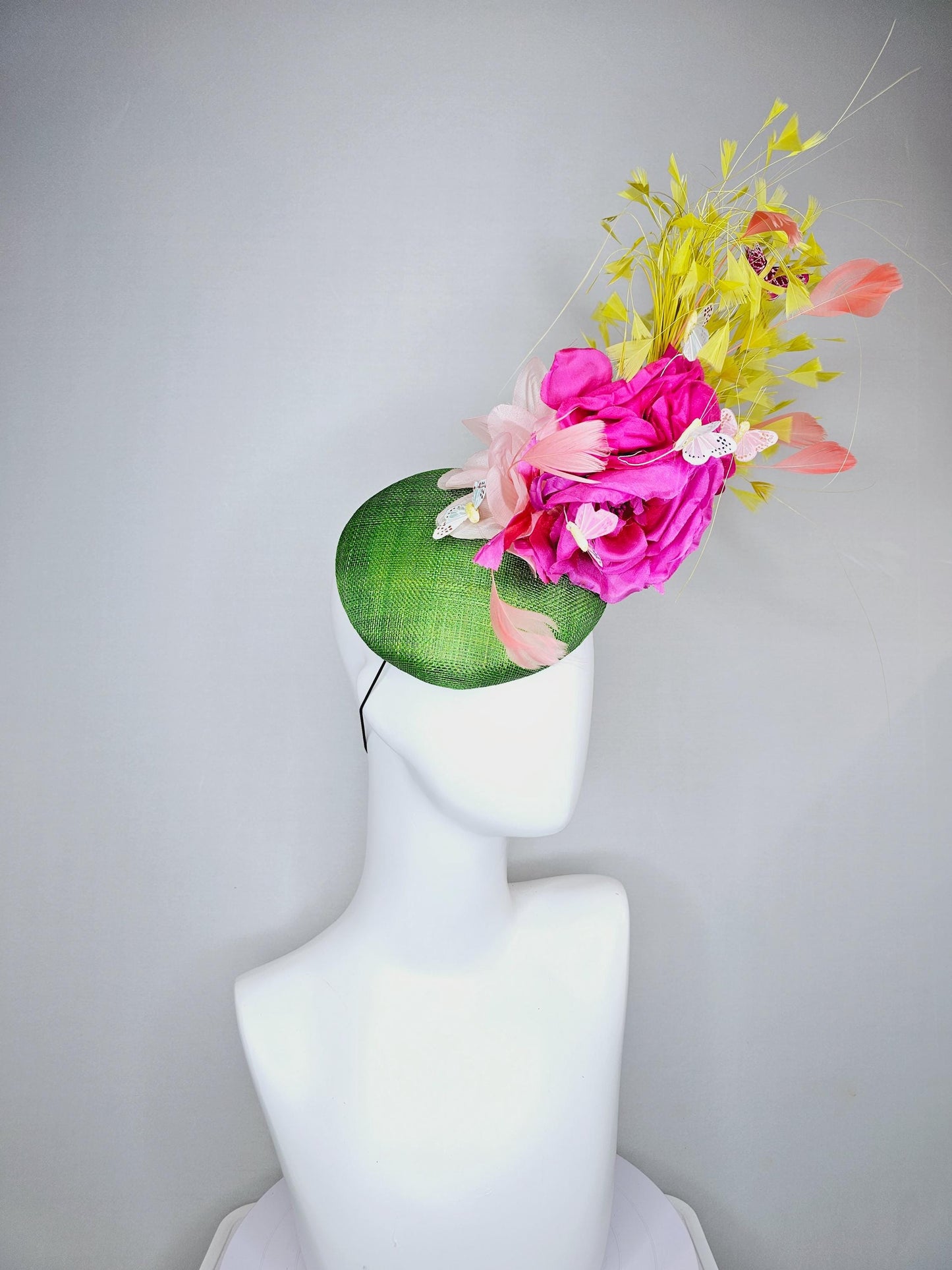 kentucky derby hat fascinator green sinamay, fuchsia pink silk organza flowers, yellow branching feathers and white butterflies