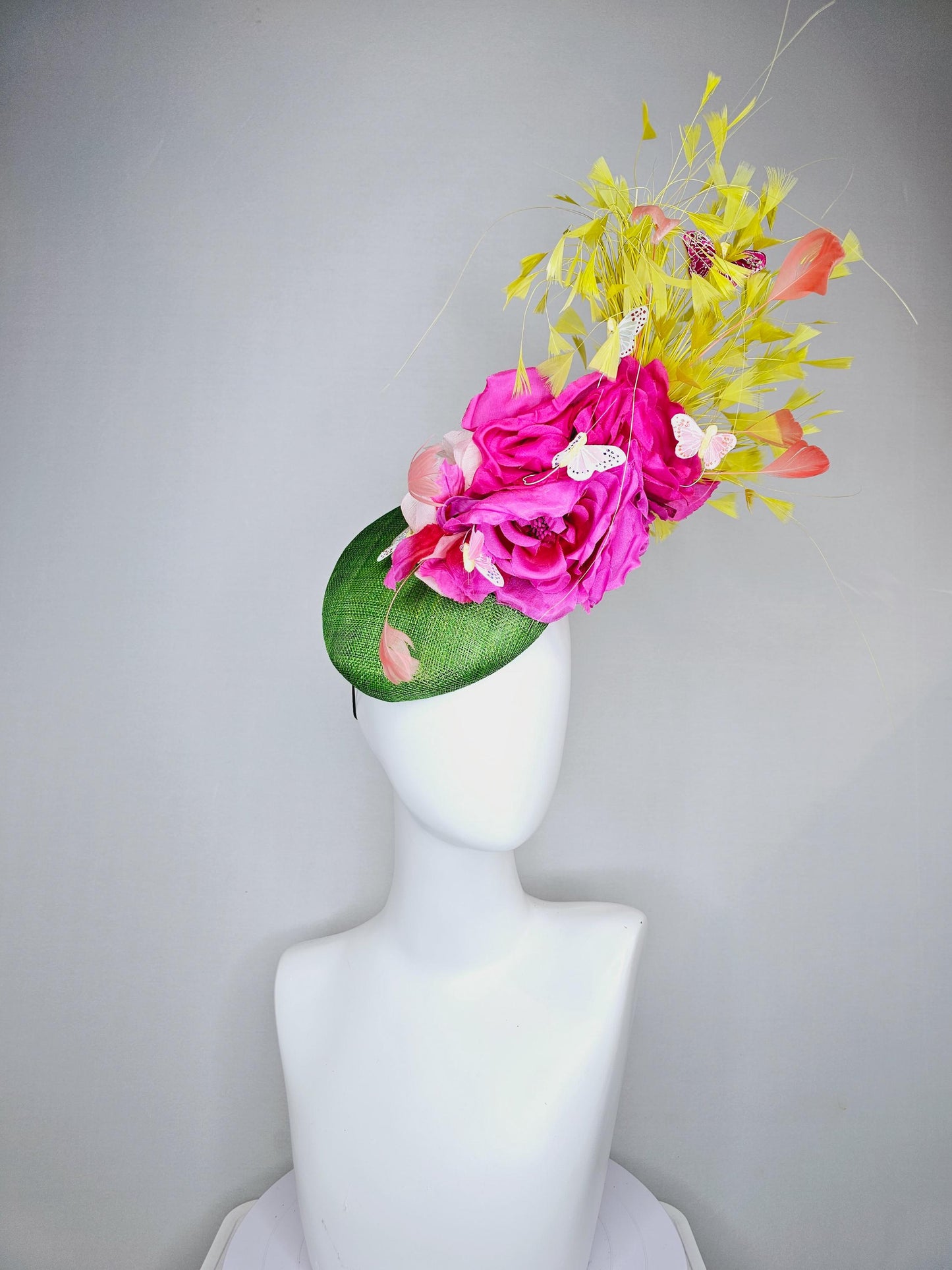 kentucky derby hat fascinator green sinamay, fuchsia pink silk organza flowers, yellow branching feathers and white butterflies