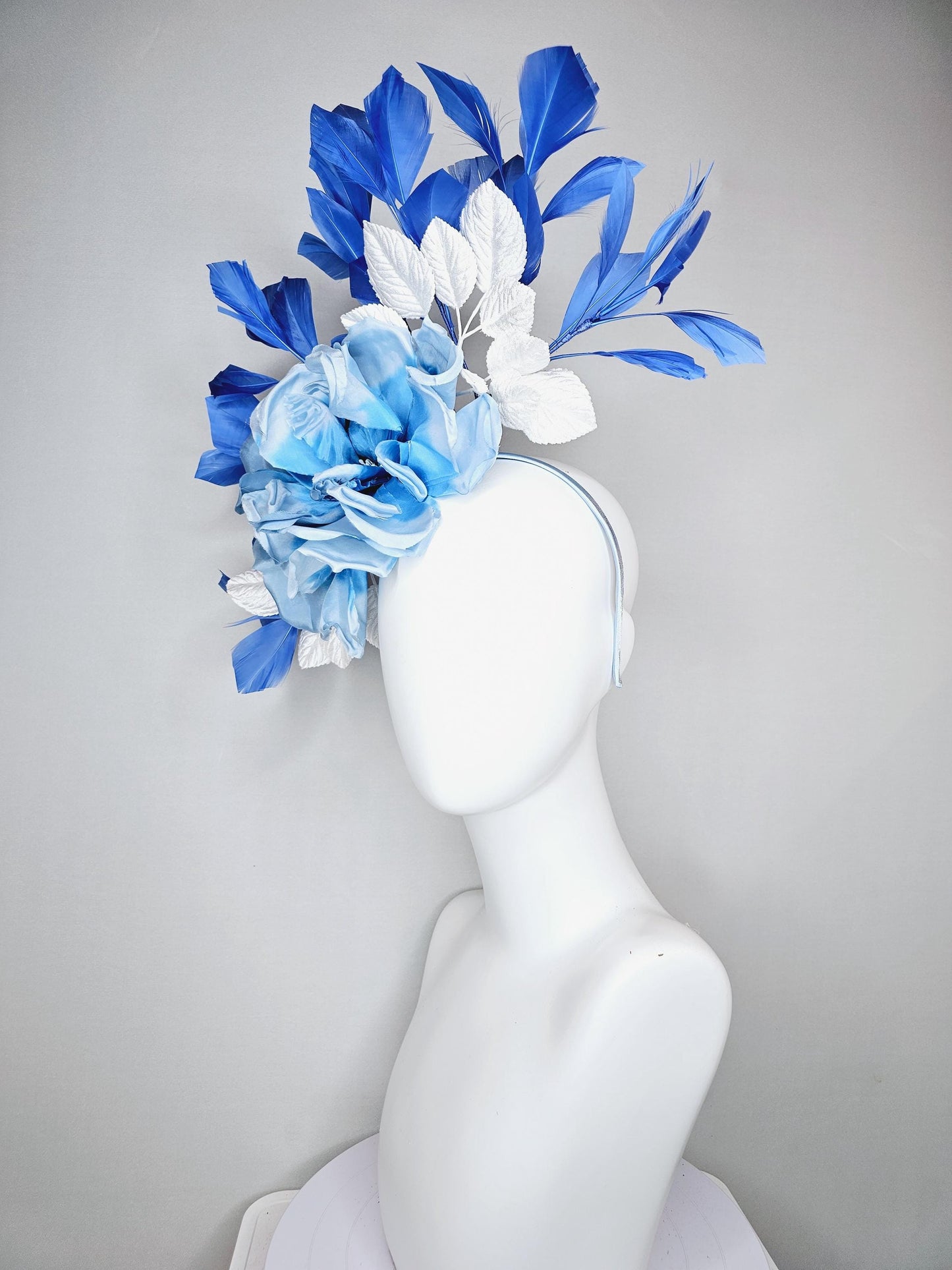 kentucky derby hat fascinator sky light blue satin silk flowers with white satin leaves and cobalt royal blue branching feathers