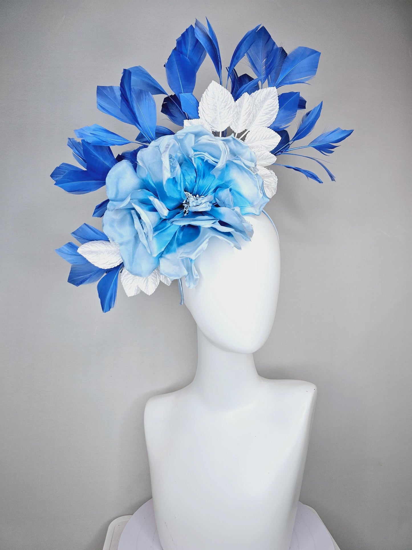 kentucky derby hat fascinator sky light blue satin silk flowers with white satin leaves and cobalt royal blue branching feathers