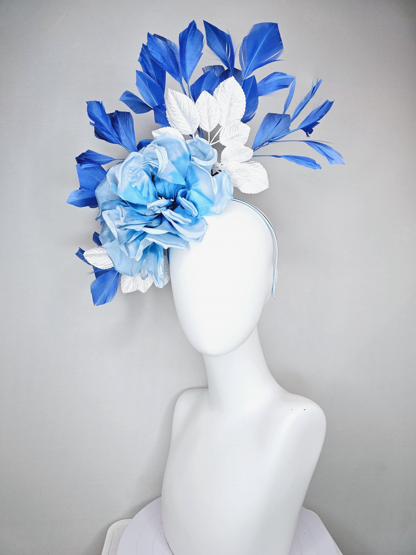 kentucky derby hat fascinator sky light blue satin silk flowers with white satin leaves and cobalt royal blue branching feathers