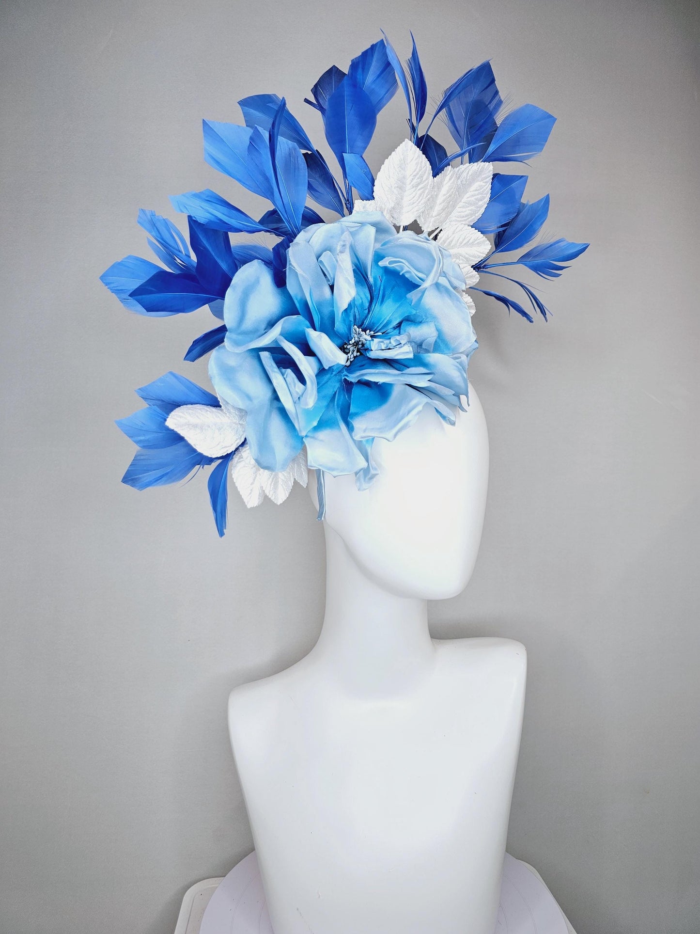 kentucky derby hat fascinator sky light blue satin silk flowers with white satin leaves and cobalt royal blue branching feathers