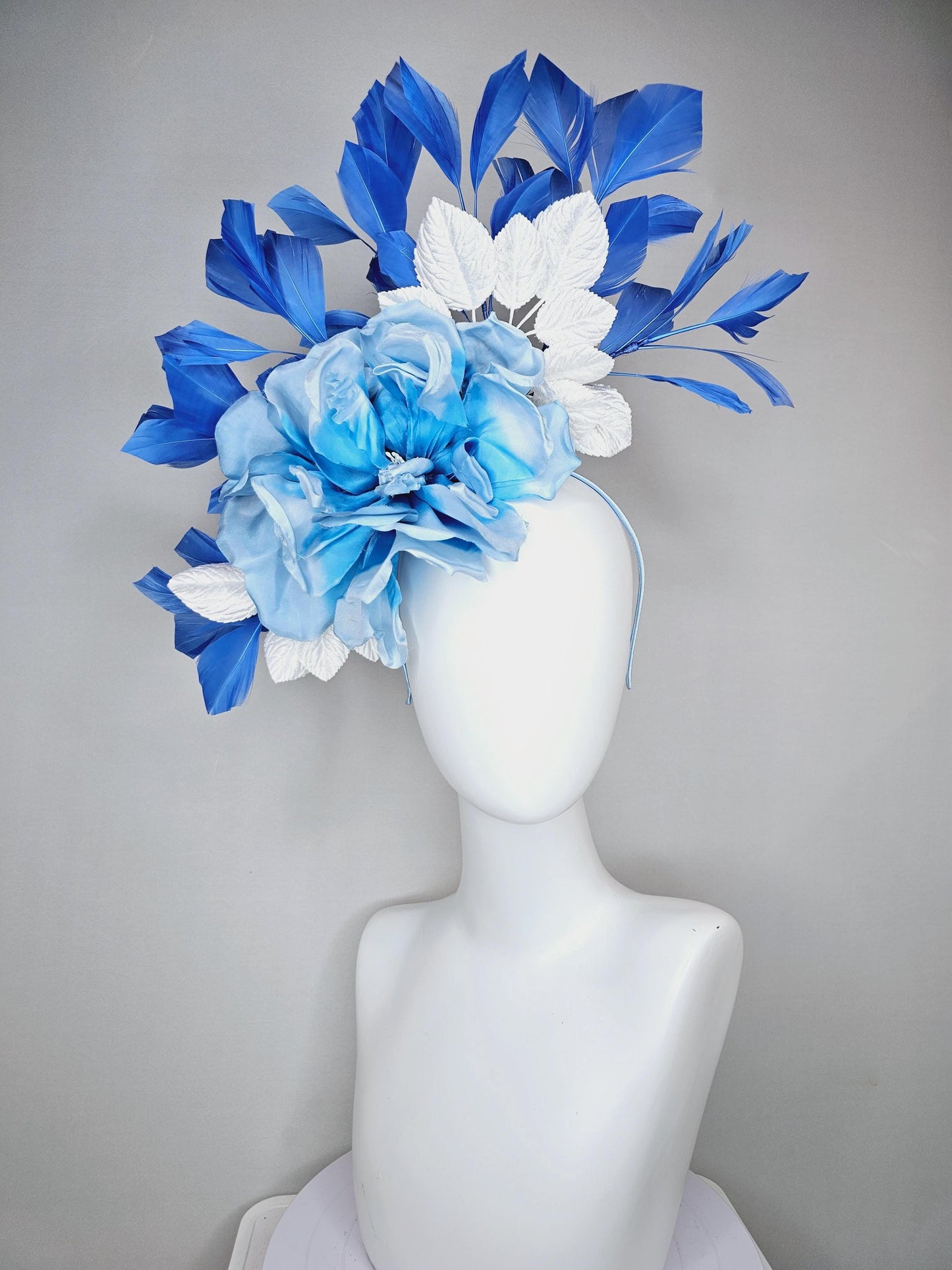 kentucky derby hat fascinator sky light blue satin silk flowers with white satin leaves and cobalt royal blue branching feathers