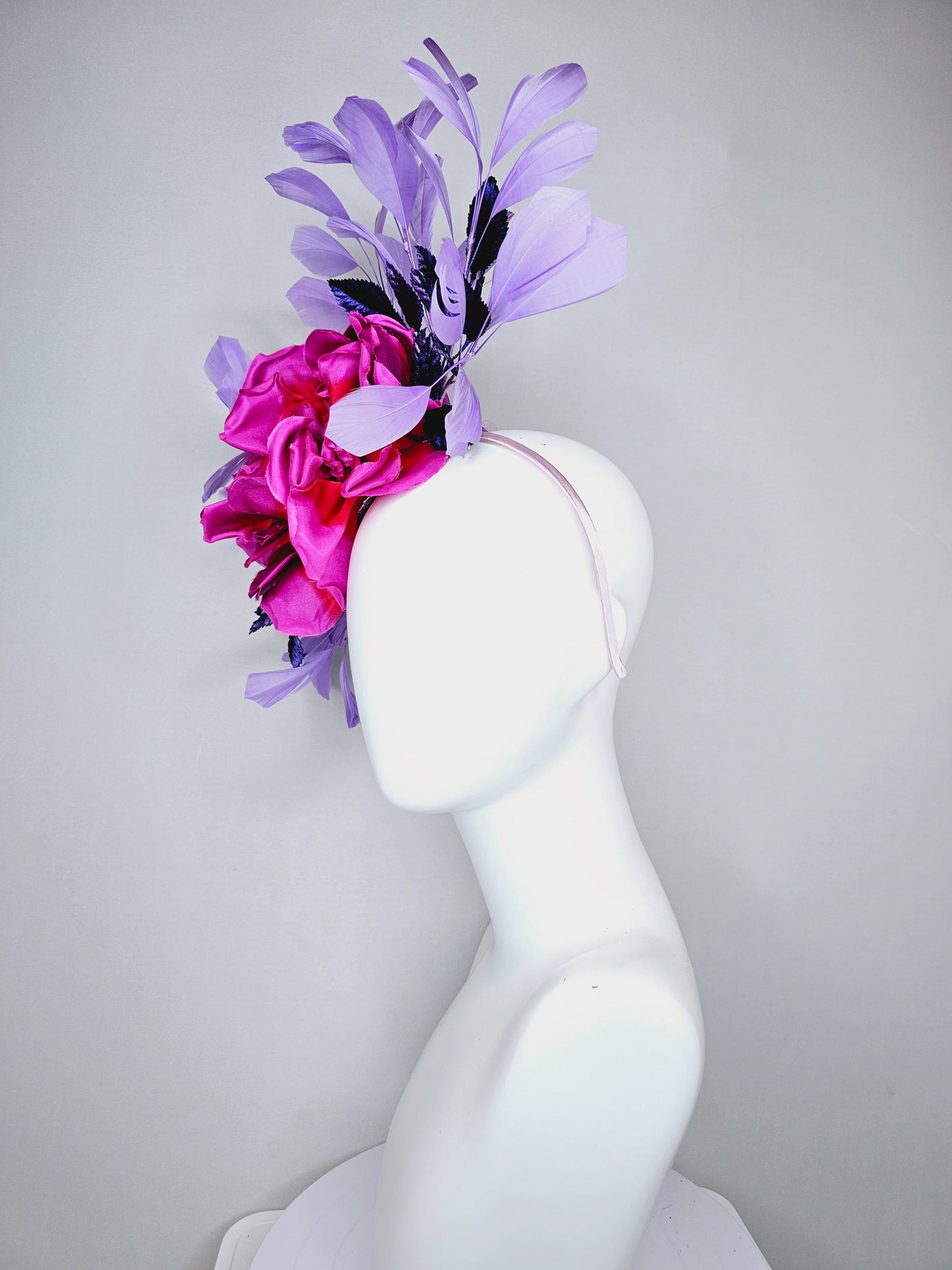 kentucky derby hat fascinator bright pink fuchsia red satin silk flower, purple violet satin leaves and purple lavender branching feathers