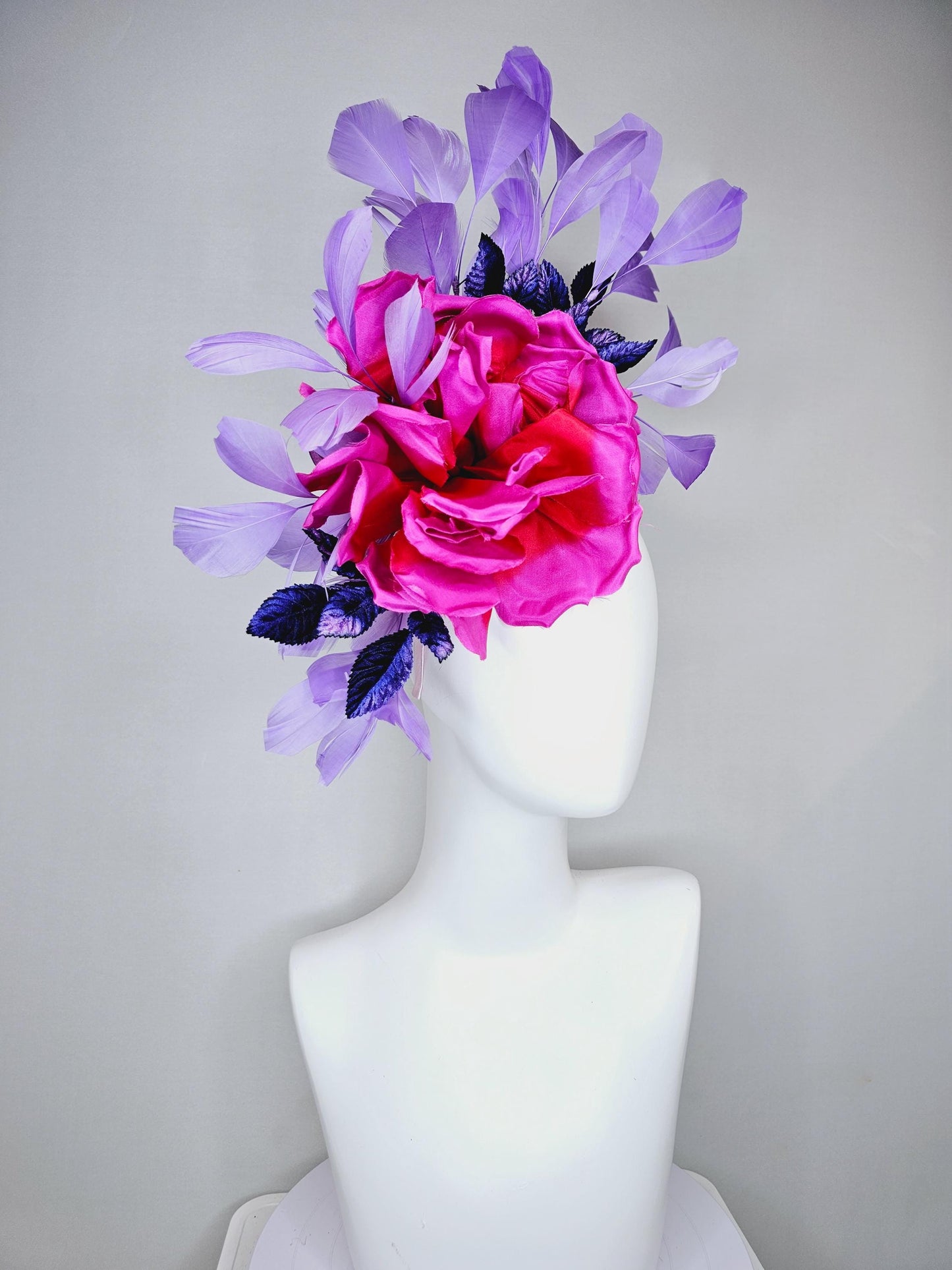 kentucky derby hat fascinator bright pink fuchsia red satin silk flower, purple violet satin leaves and purple lavender branching feathers