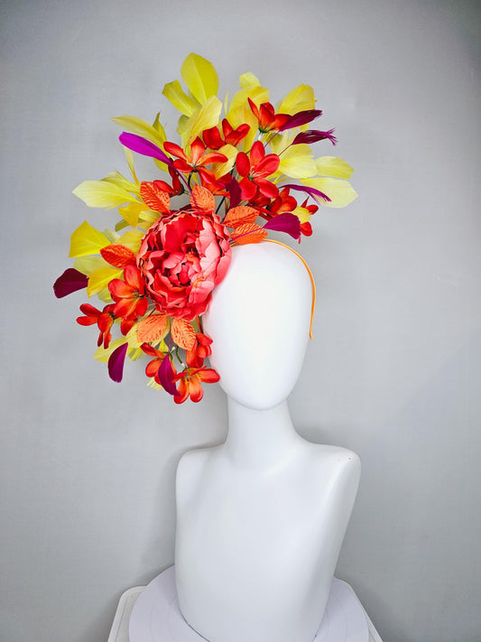 kentucky derby hat fascinator coral orange silk satin flowers with orange satin leaves, yellow and pink branching feathers on thin headband