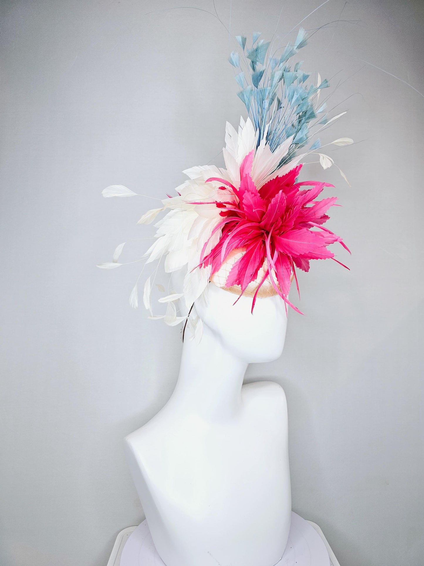 kentucky derby hat fascinator champagne satin with netting,bright pink and white ivory feather flower, light teal blue branching feathers