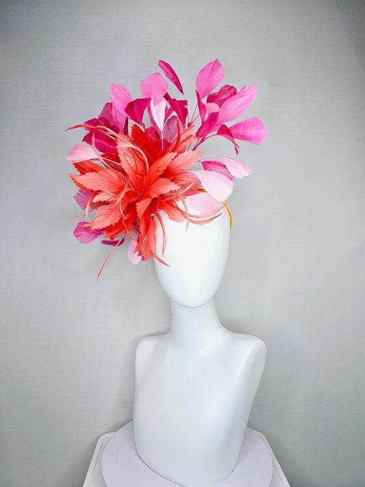 kentucky derby hat fascinator with coral orange feather flowers, fuchsia pink and light blush pink branching feathers, thin headband