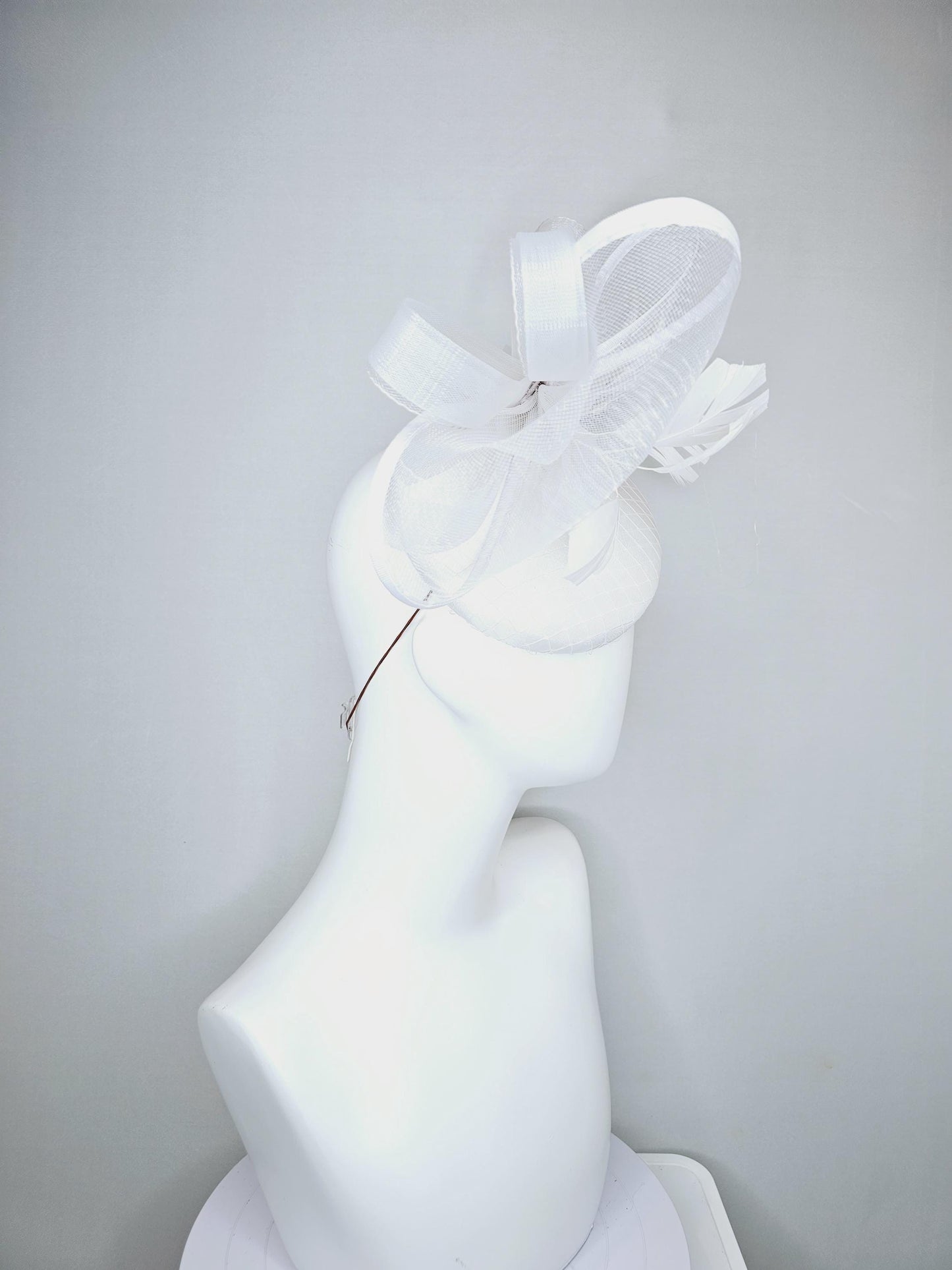 kentucky derby hat fascinator white satin with netting, branching white feathers and large mesh white bow