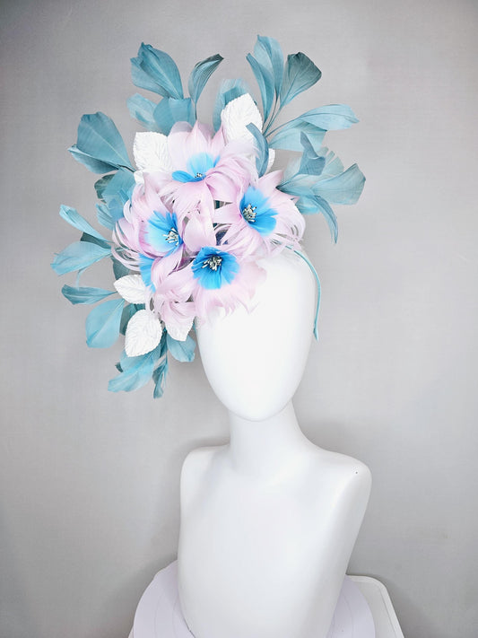 kentucky derby hat fascinator with pale pink feather flowers with sky blue feather cores, white leaves and teal blue branching feathers