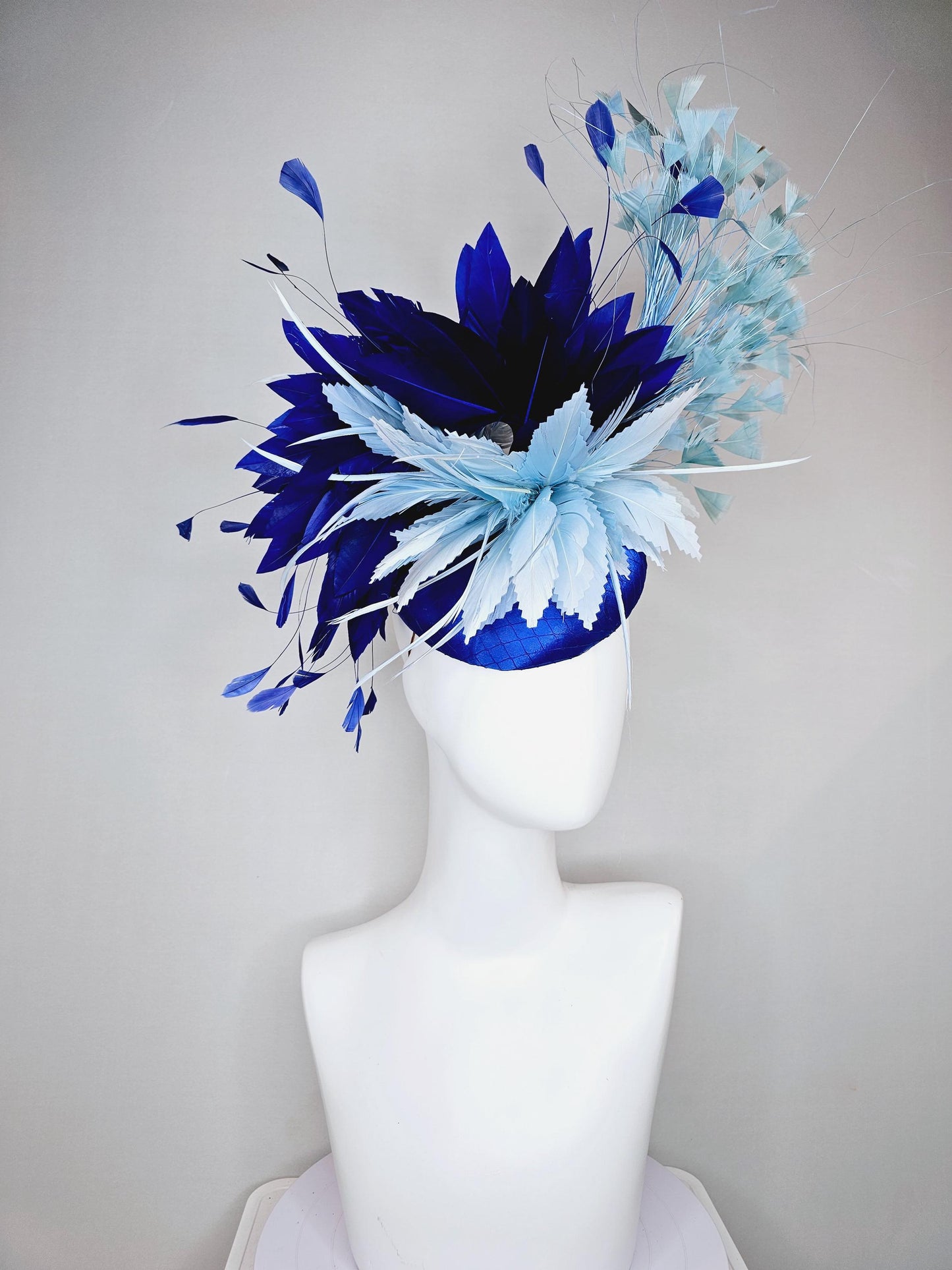 kentucky derby hat fascinator royal blue satin with netting, aqua turquoise navy blue feather flower, light teal blue branching feathers