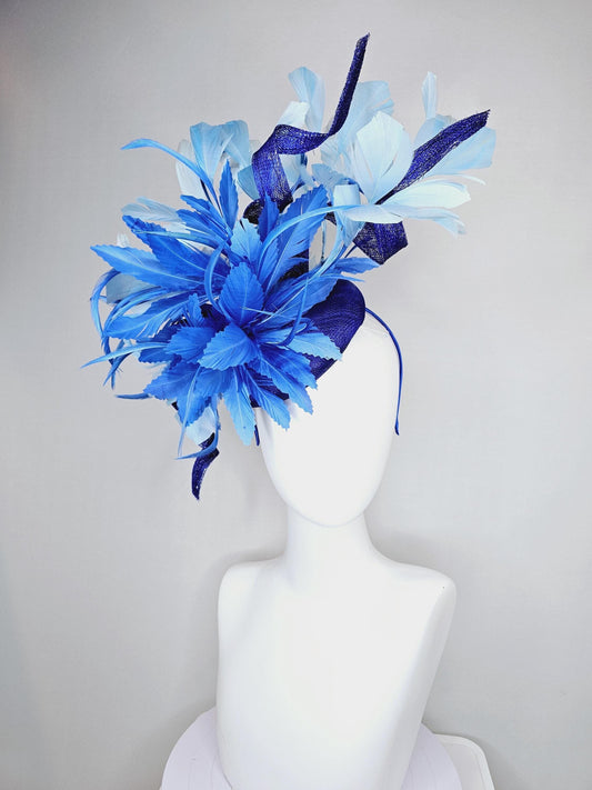 kentucky derby hat fascinator navy blue sinamay, fluffy royal blue zigzag feathers, navy blue sinamay curls, light blue branching feathers