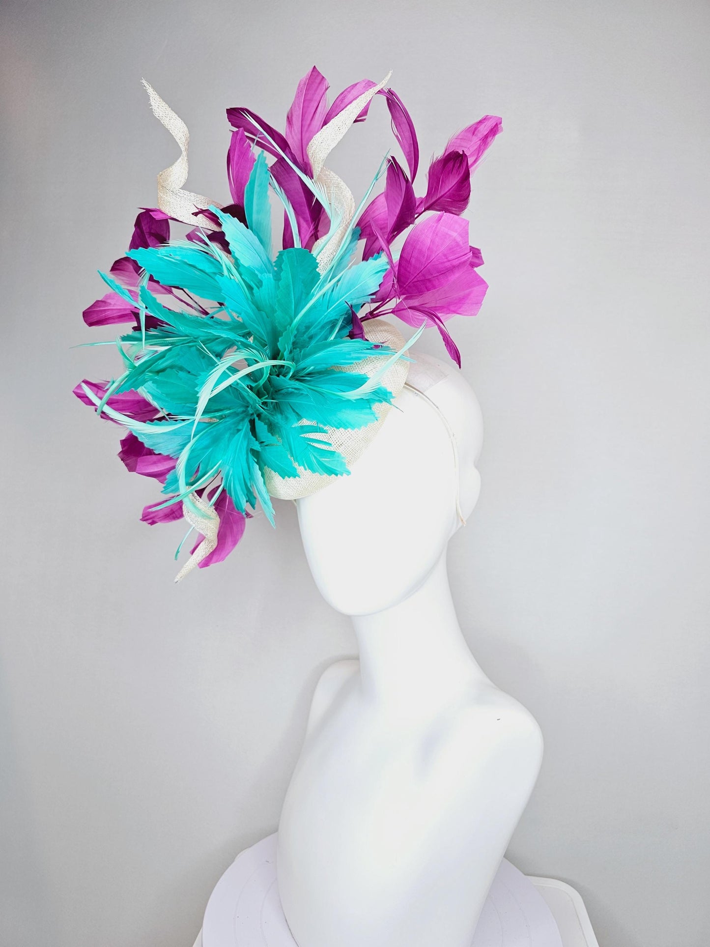 kentucky derby hat fascinator white sinamay, fluffy aqua blue green zigzag feathers, white sinamay curls, magenta purple branching feathers