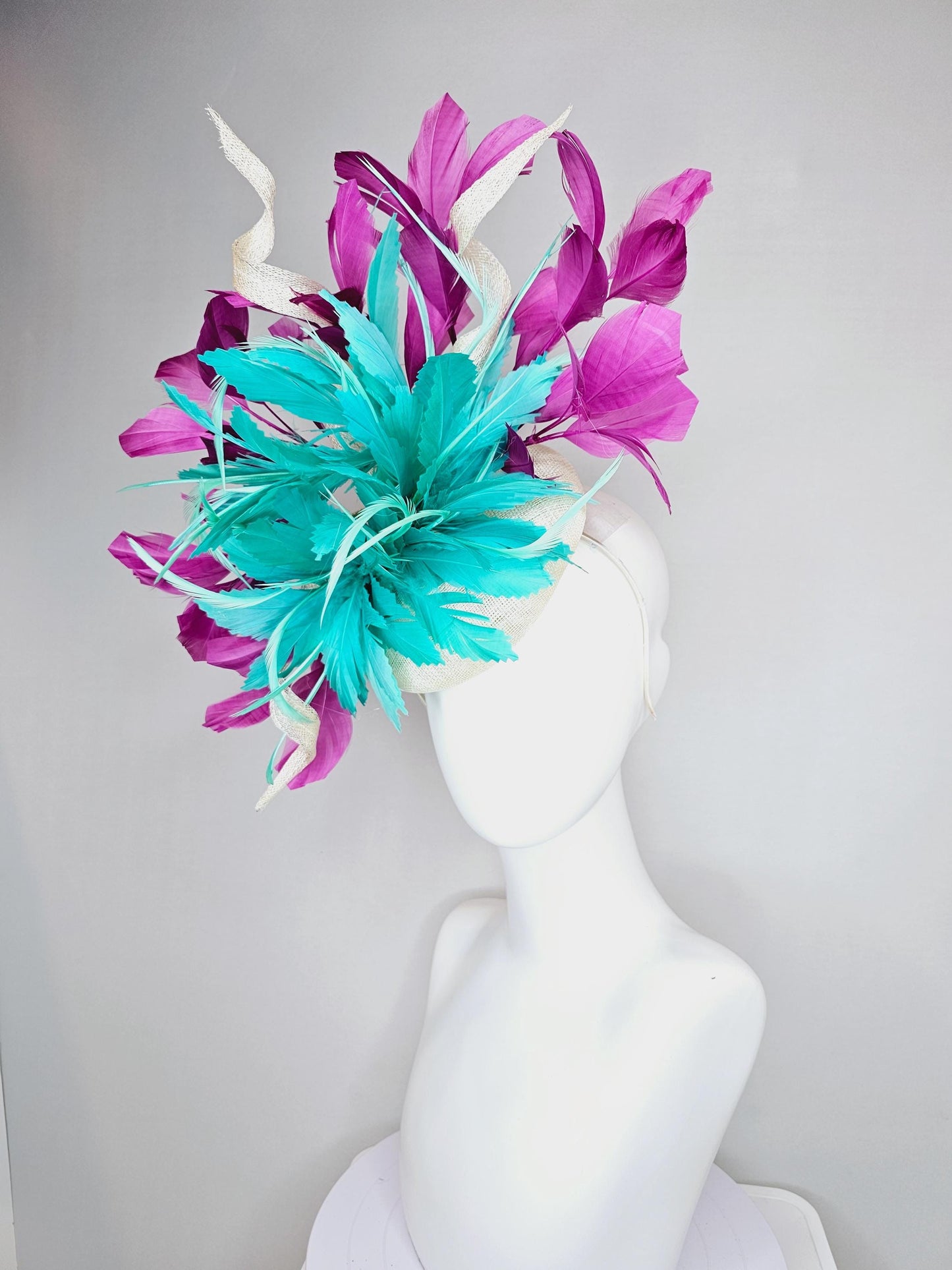 kentucky derby hat fascinator white sinamay, fluffy aqua blue green zigzag feathers, white sinamay curls, magenta purple branching feathers