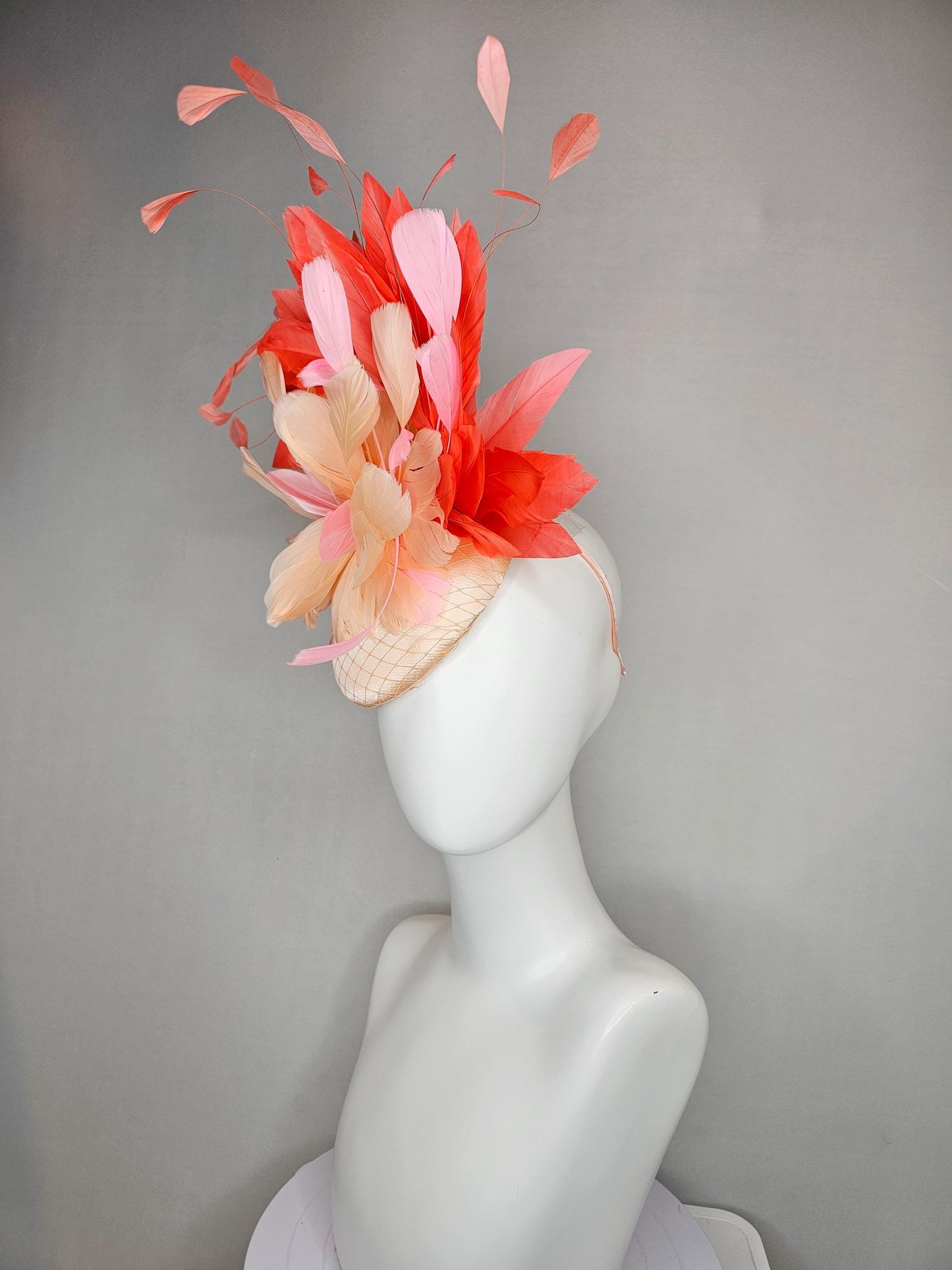 kentucky derby hat fascinator neutral beige satin with netting, fluffy neutral beige, light pink, coral orange branching feathers