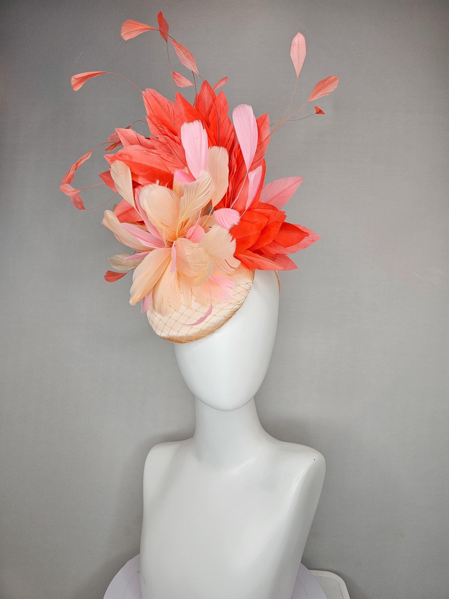 kentucky derby hat fascinator neutral beige satin with netting, fluffy neutral beige, light pink, coral orange branching feathers