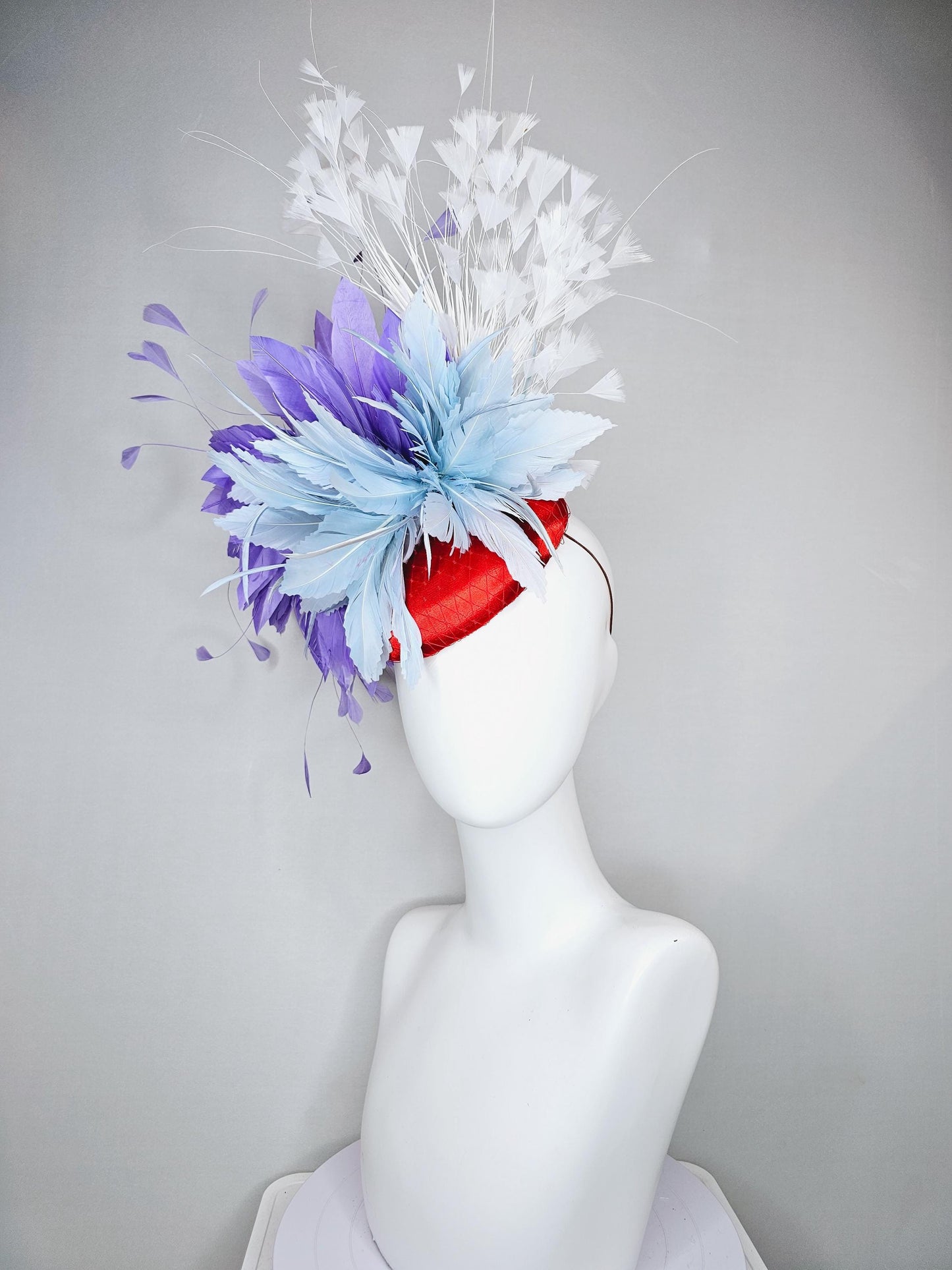 kentucky derby hat fascinator red satin with netting, light teal baby blue and purple lavender feather flower, white branching feathers