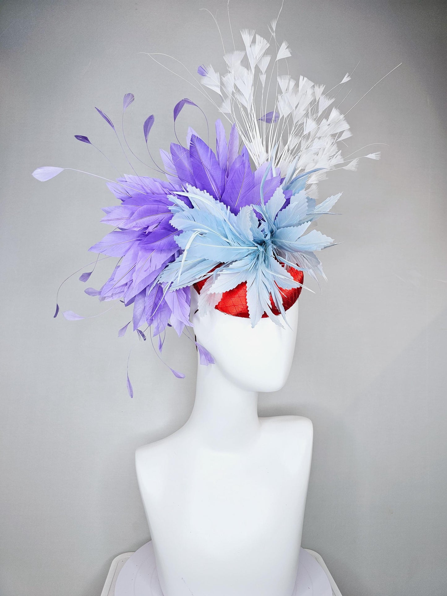 kentucky derby hat fascinator red satin with netting, light teal baby blue and purple lavender feather flower, white branching feathers