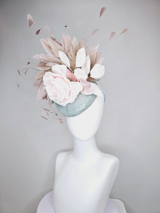 kentucky derby hat fascinator light blue sinamay with light pink satin rose flower, light pink leaves, light brown taupe branching feathers