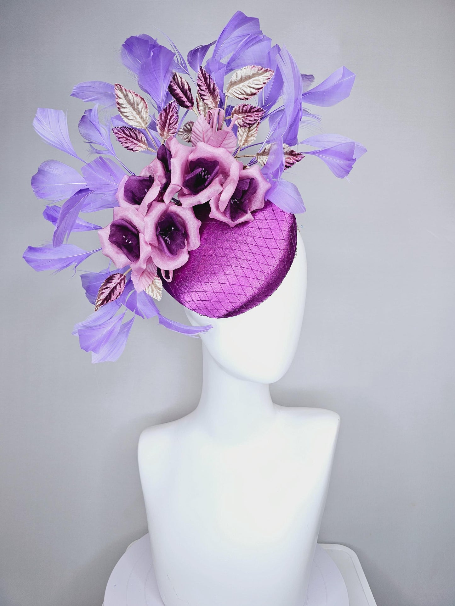 kentucky derby hat fascinator purple satin with netting,purple lilac satin flowers, ombre purple leaves, purple lavender branching feathers