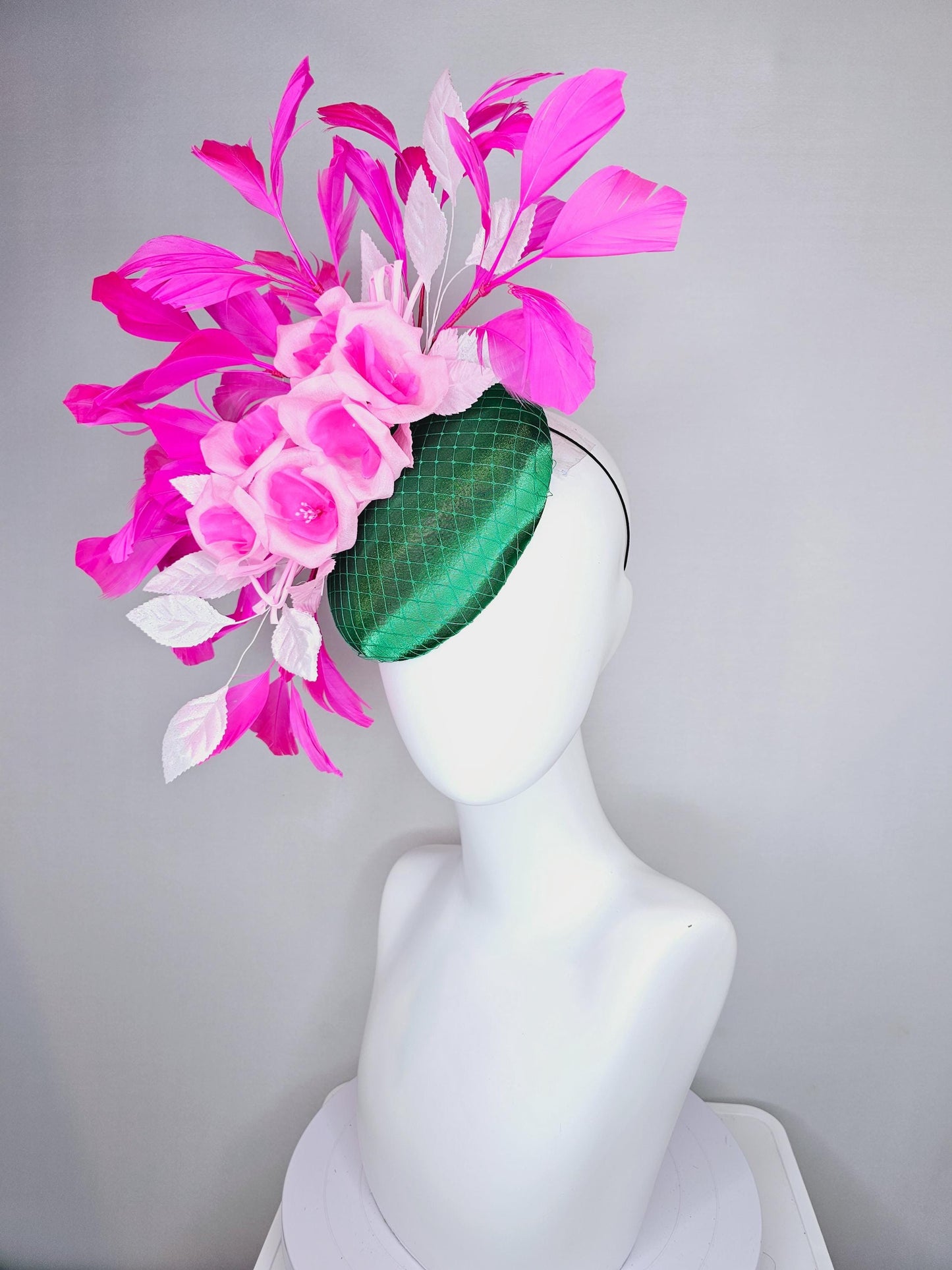 kentucky derby hat fascinator green satin with netting, blush pink satin flowers, light pink leaves, bright pink fuchsia branching feathers