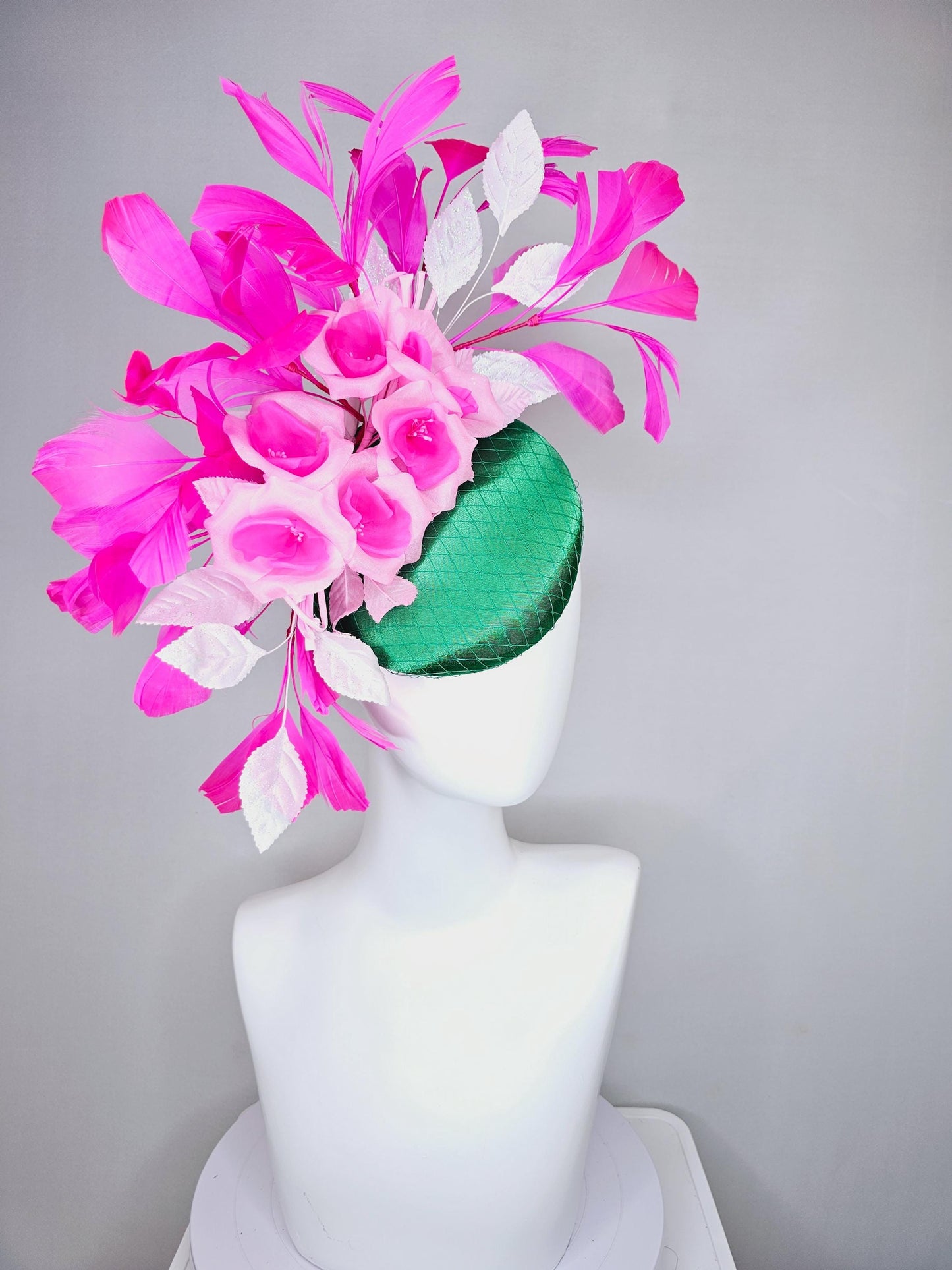 kentucky derby hat fascinator green satin with netting, blush pink satin flowers, light pink leaves, bright pink fuchsia branching feathers