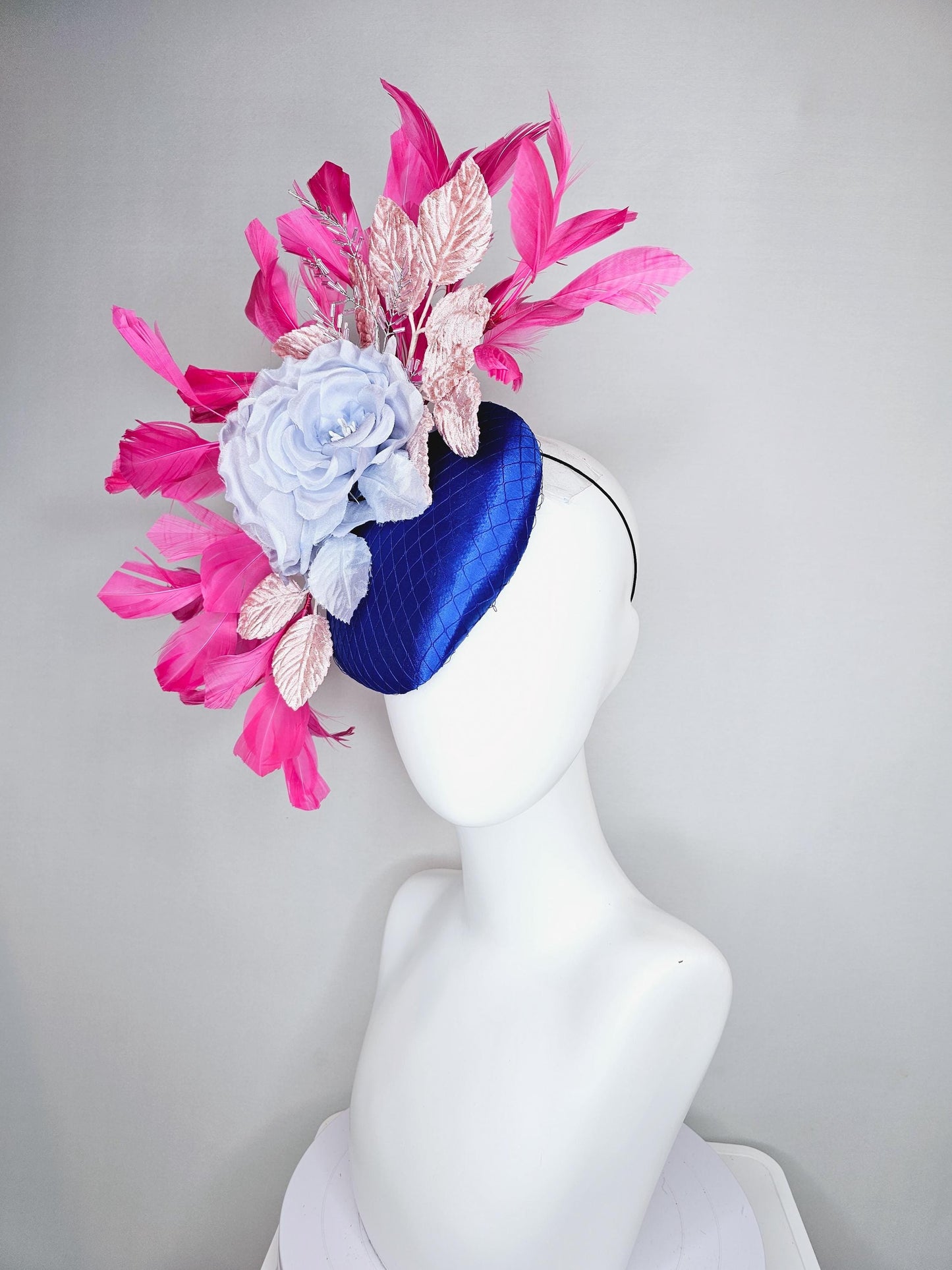 kentucky derby hat fascinator cobalt blue satin with netting,light sky blue satin silk rose flower,light pink leaves,pink branching feathers