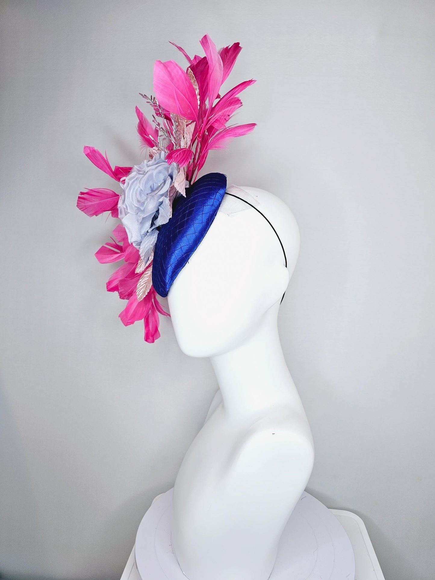 kentucky derby hat fascinator cobalt blue satin with netting,light sky blue satin silk rose flower,light pink leaves,pink branching feathers