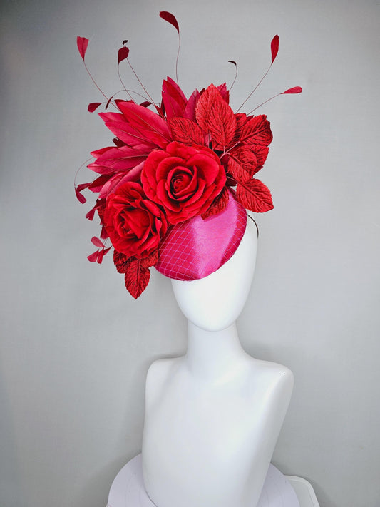 kentucky derby hat fascinator cherry red satin with netting,scarlet red satin rose flowers,scarlet red leaves,scarlet red branching feathers