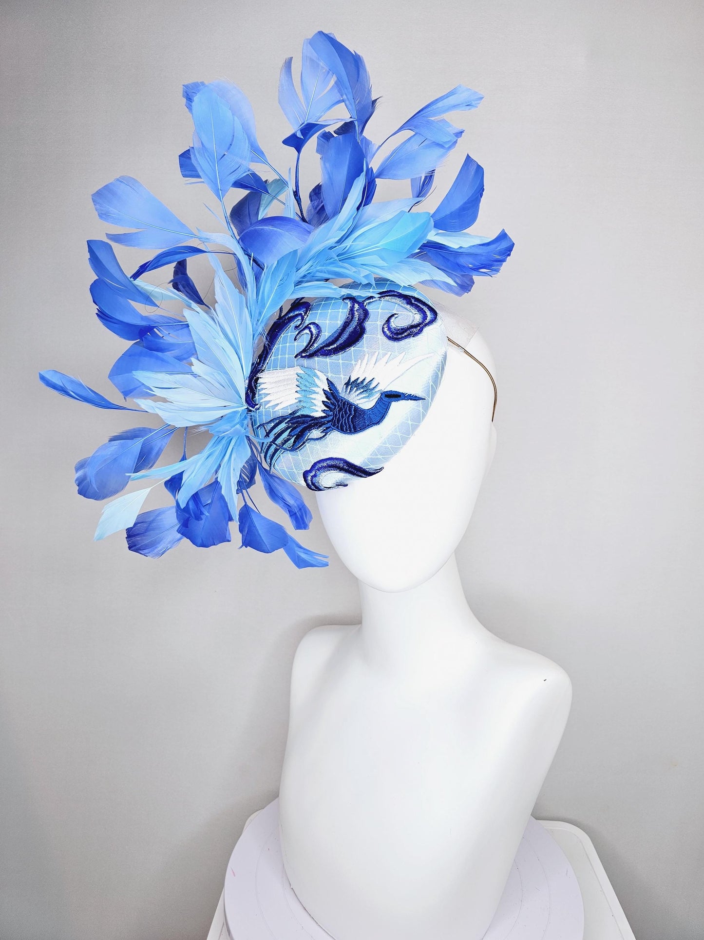 kentucky derby hat fascinator light blue satin with netting embroidered white blue birds, sky blue royal blue cobalt blue branching feathers