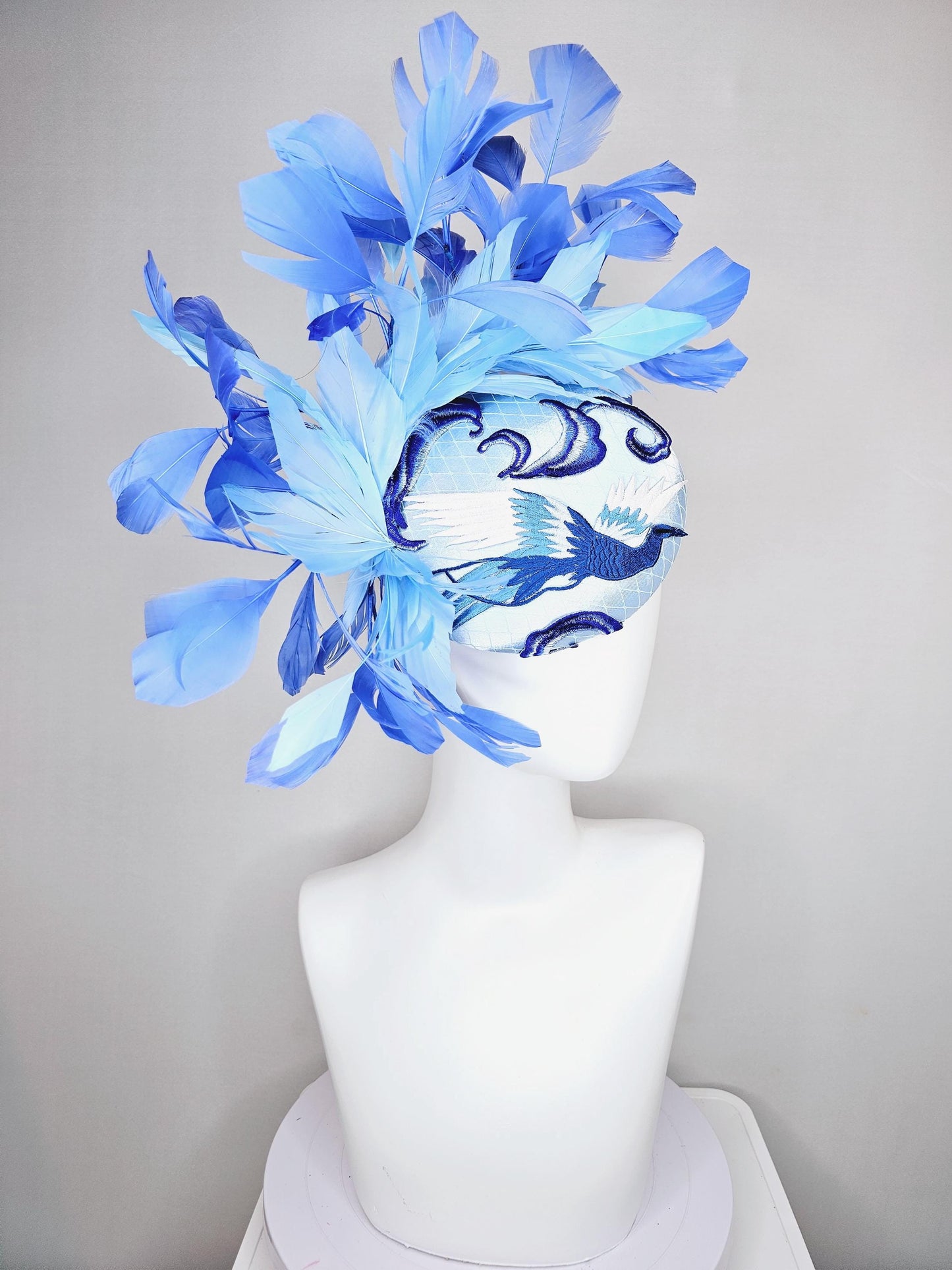 kentucky derby hat fascinator light blue satin with netting embroidered white blue birds, sky blue royal blue cobalt blue branching feathers