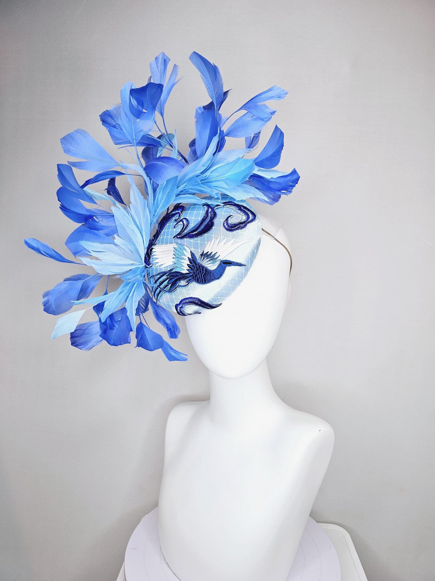 kentucky derby hat fascinator light blue satin with netting embroidered white blue birds, sky blue royal blue cobalt blue branching feathers