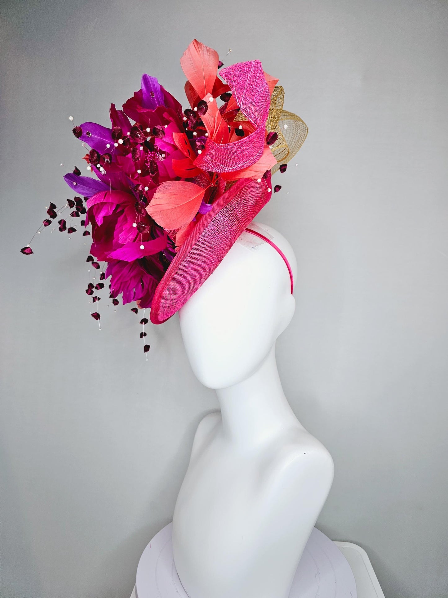 kentucky derby hat fascinator pink sinamay saucer,pink fuchsia feather flowers,pink purple orange branching feathers,pearl and floral stems