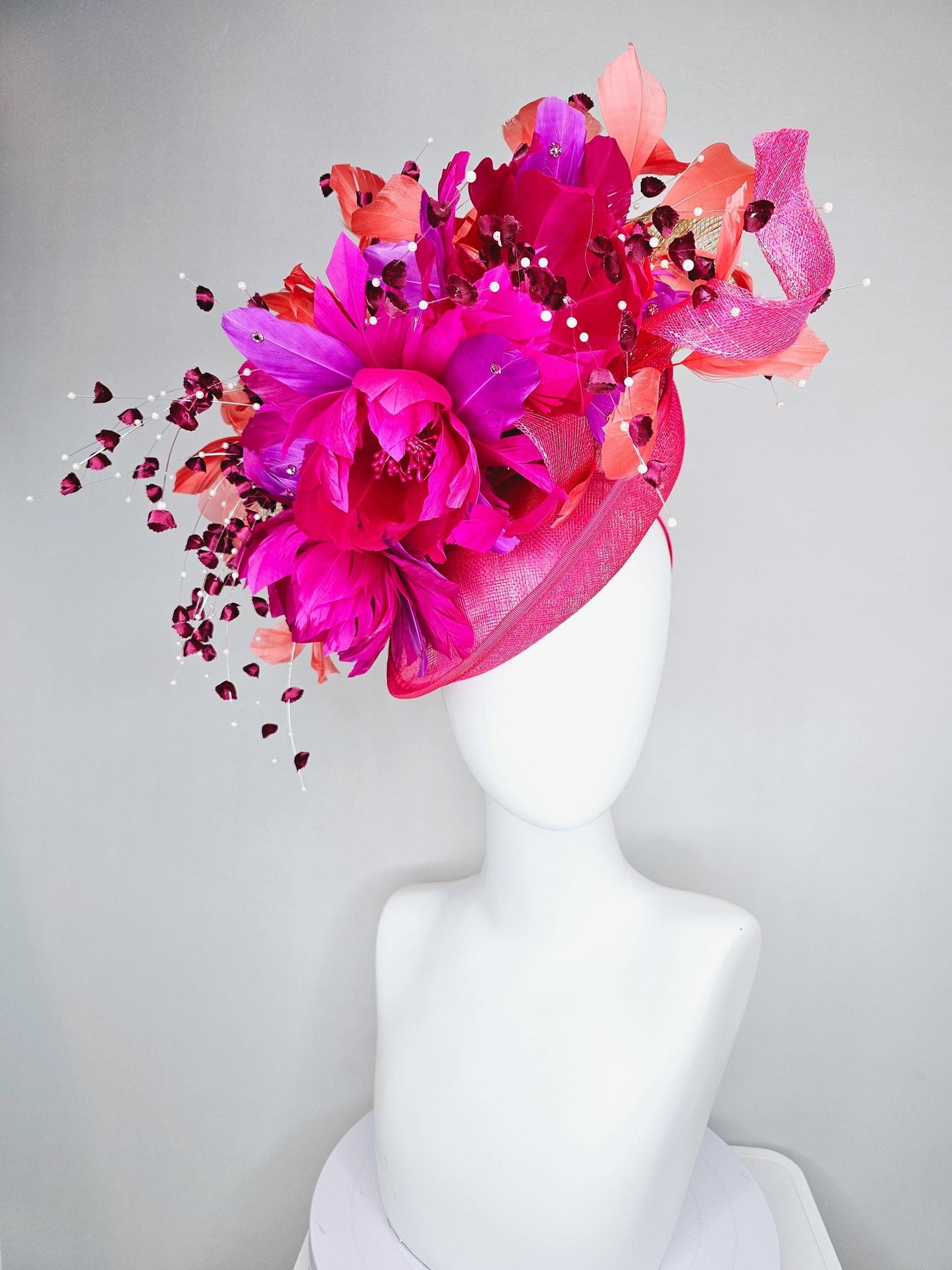 kentucky derby hat fascinator pink sinamay saucer,pink fuchsia feather flowers,pink purple orange branching feathers,pearl and floral stems