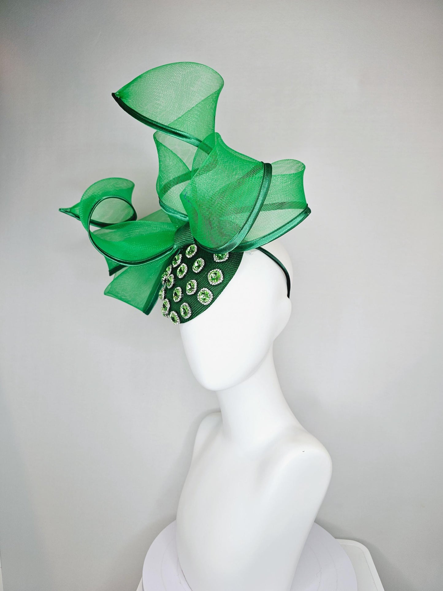 kentucky derby hat fascinator green sinamay with green crystal jewels, emerald green mesh and wired ribbon large bendable bow decor