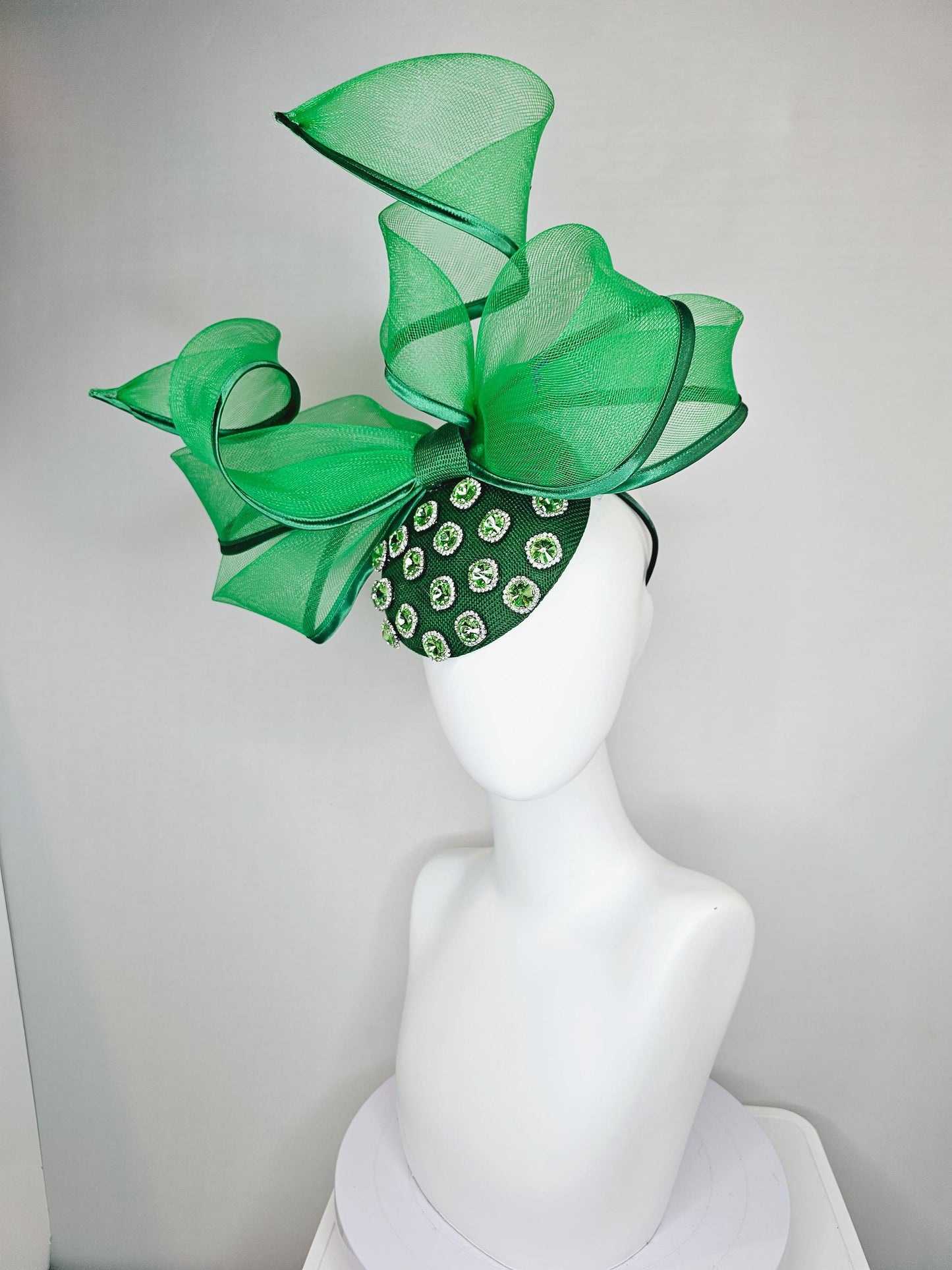 kentucky derby hat fascinator green sinamay with green crystal jewels, emerald green mesh and wired ribbon large bendable bow decor