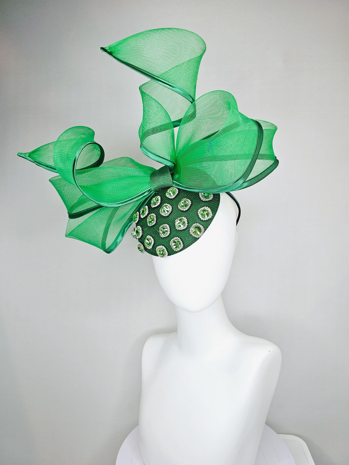 kentucky derby hat fascinator green sinamay with green crystal jewels, emerald green mesh and wired ribbon large bendable bow decor