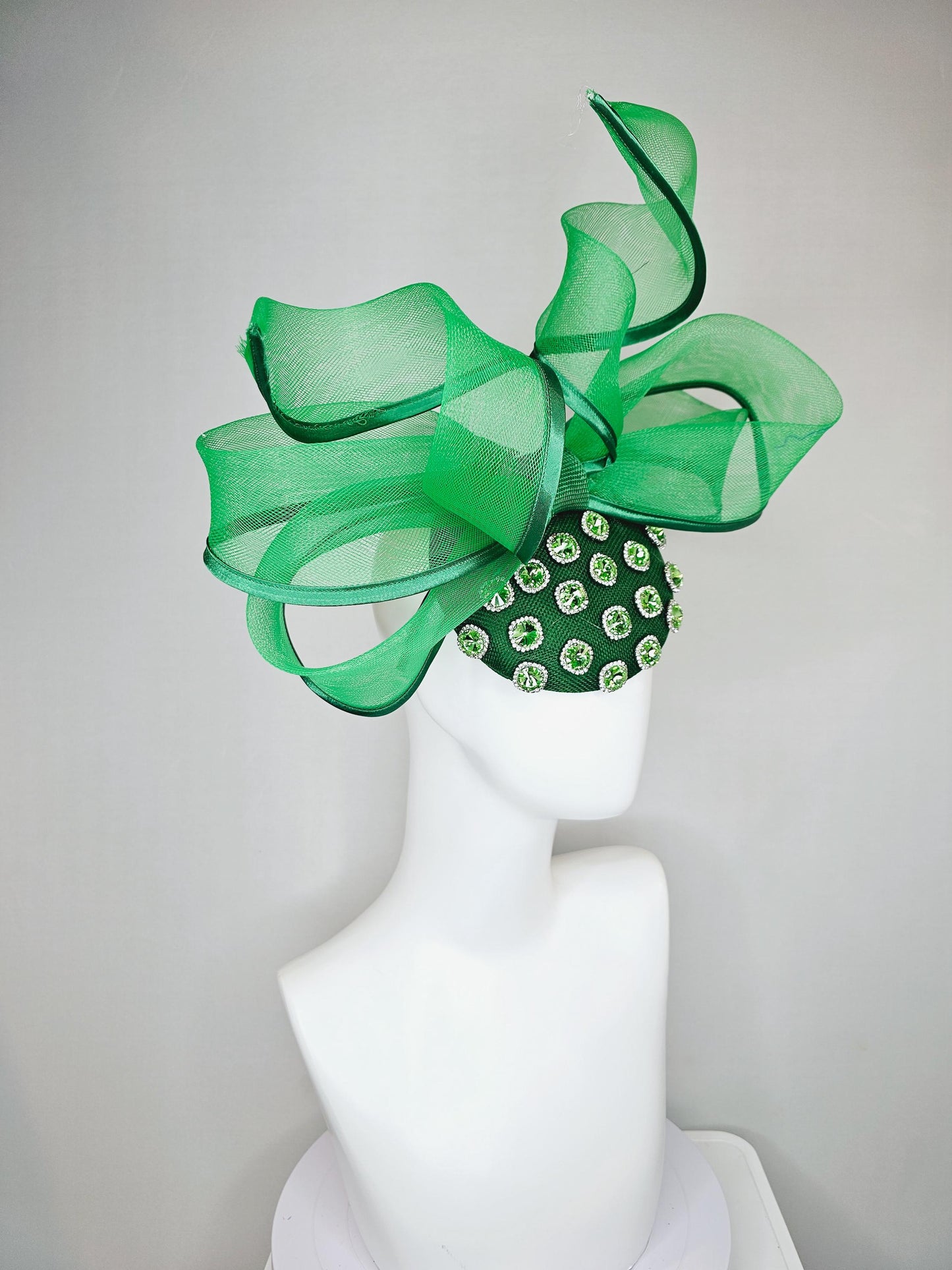 kentucky derby hat fascinator green sinamay with green crystal jewels, emerald green mesh and wired ribbon large bendable bow decor