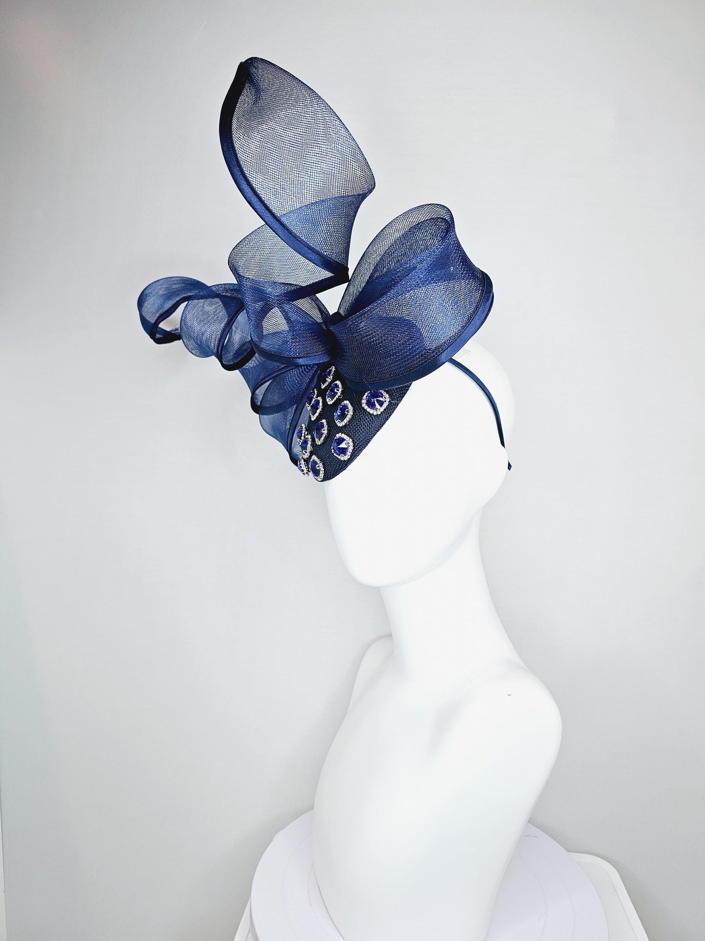 kentucky derby hat fascinator navy blue sinamay with navy blue crystal jewels, mesh and wired ribbon large bendable navy blue bow decor