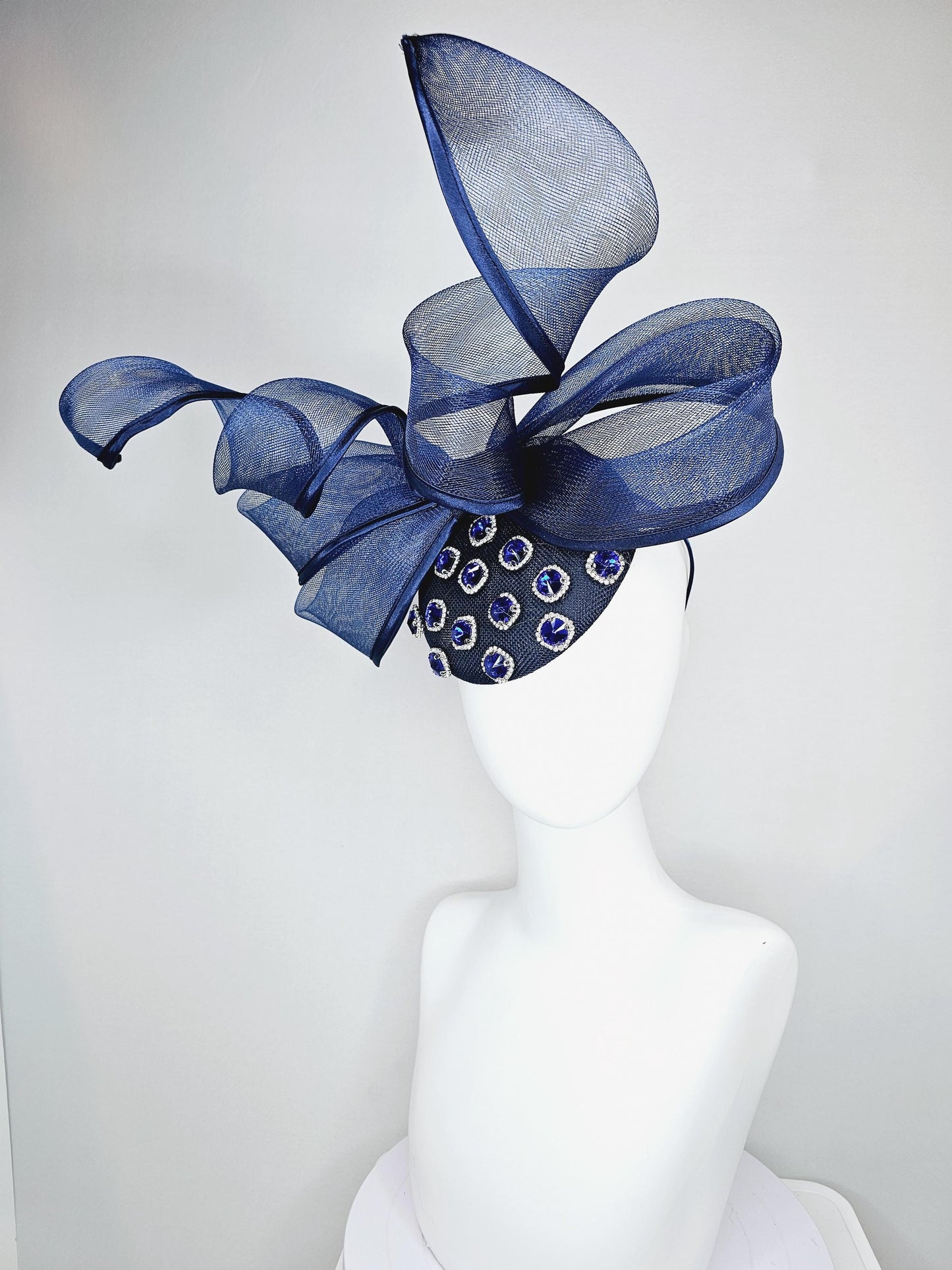 kentucky derby hat fascinator navy blue sinamay with navy blue crystal jewels, mesh and wired ribbon large bendable navy blue bow decor