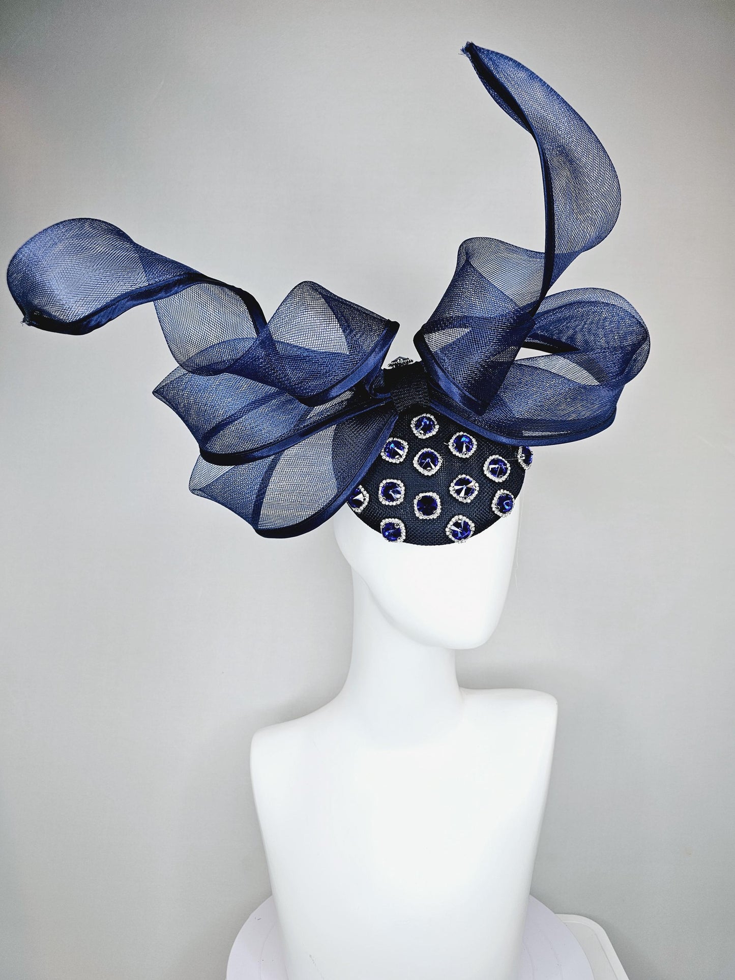 kentucky derby hat fascinator navy blue sinamay with navy blue crystal jewels, mesh and wired ribbon large bendable navy blue bow decor